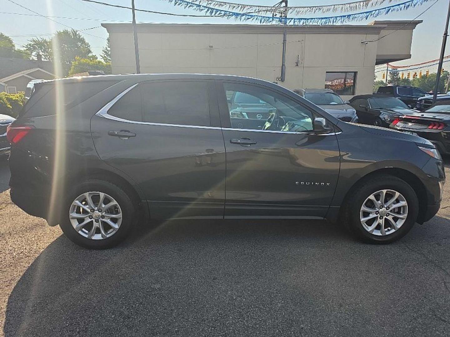 2019 GRAY /BLACK Chevrolet Equinox LT AWD (2GNAXUEV8K6) with an 1.5L L4 DOHC 16V TURBO engine, 6A transmission, located at 3304 Woodville Road, Northwood, OH, 43619, (419) 210-8019, 41.612694, -83.480743 - Your #1 Destination for Auto Loans and mdash;No Matter Your Credit!At our dealership, we believe everyone deserves the opportunity to drive their dream car and mdash;whether you have good credit, bad credit, or no credit at all. With a wide selection of hundreds of cars, trucks, and SUVs, you'll fin- Photo#5
