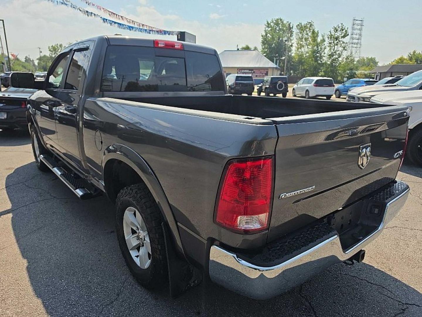 2017 GRAY /GRAY RAM 1500 SLT Quad Cab 4WD (1C6RR7GT7HS) with an 5.7L V8 OHV 16V engine, 8A transmission, located at 3304 Woodville Road, Northwood, OH, 43619, (419) 210-8019, 41.612694, -83.480743- Photo#0