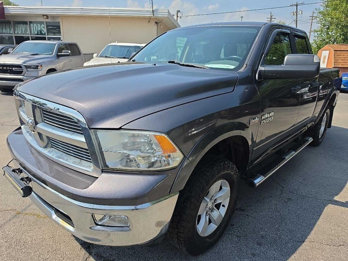 2017 GRAY /GRAY RAM 1500 SLT Quad Cab 4WD (1C6RR7GT7HS) with an 5.7L V8 OHV 16V engine, 8A transmission, located at 3304 Woodville Road, Northwood, OH, 43619, (419) 210-8019, 41.612694, -83.480743- Photo#1