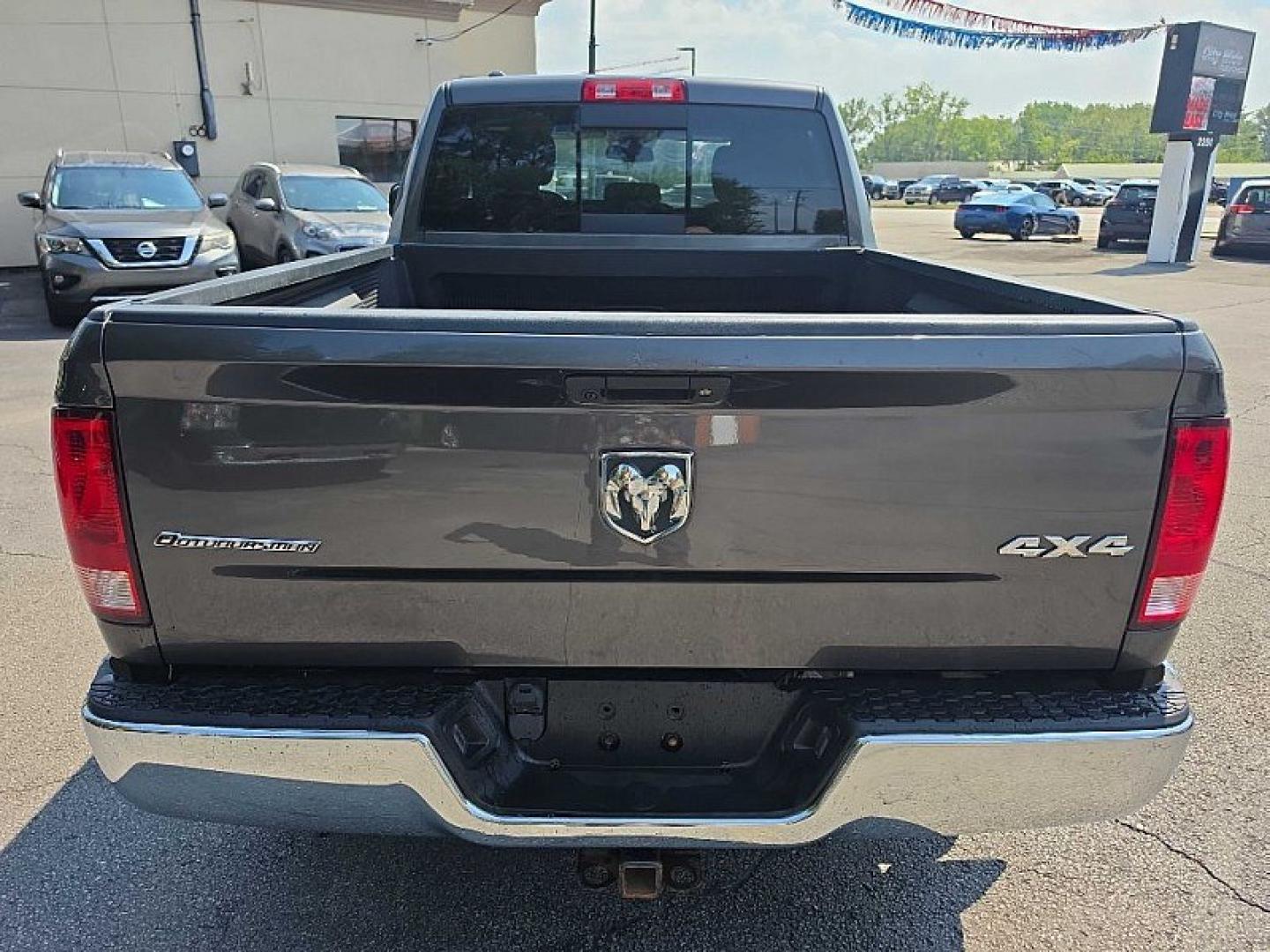 2017 GRAY /GRAY RAM 1500 SLT Quad Cab 4WD (1C6RR7GT7HS) with an 5.7L V8 OHV 16V engine, 8A transmission, located at 3304 Woodville Road, Northwood, OH, 43619, (419) 210-8019, 41.612694, -83.480743- Photo#2