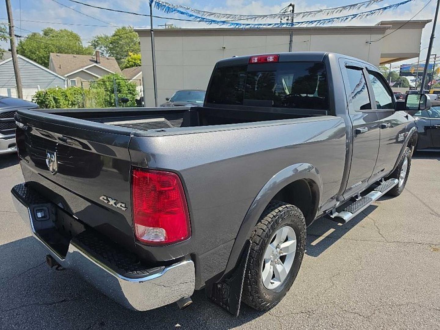 2017 GRAY /GRAY RAM 1500 SLT Quad Cab 4WD (1C6RR7GT7HS) with an 5.7L V8 OHV 16V engine, 8A transmission, located at 3304 Woodville Road, Northwood, OH, 43619, (419) 210-8019, 41.612694, -83.480743- Photo#3