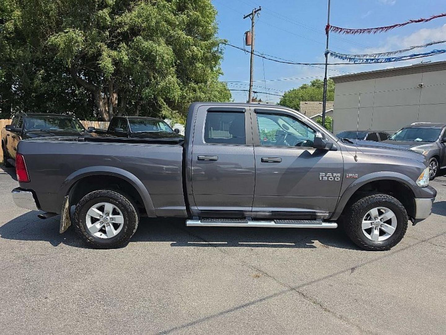 2017 GRAY /GRAY RAM 1500 SLT Quad Cab 4WD (1C6RR7GT7HS) with an 5.7L V8 OHV 16V engine, 8A transmission, located at 3304 Woodville Road, Northwood, OH, 43619, (419) 210-8019, 41.612694, -83.480743- Photo#5