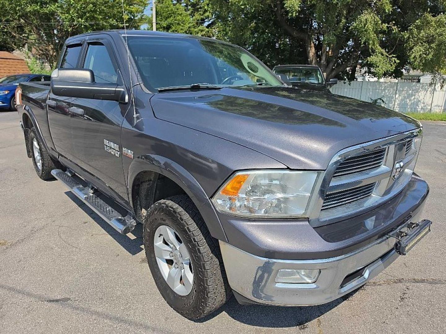 2017 GRAY /GRAY RAM 1500 SLT Quad Cab 4WD (1C6RR7GT7HS) with an 5.7L V8 OHV 16V engine, 8A transmission, located at 3304 Woodville Road, Northwood, OH, 43619, (419) 210-8019, 41.612694, -83.480743- Photo#6