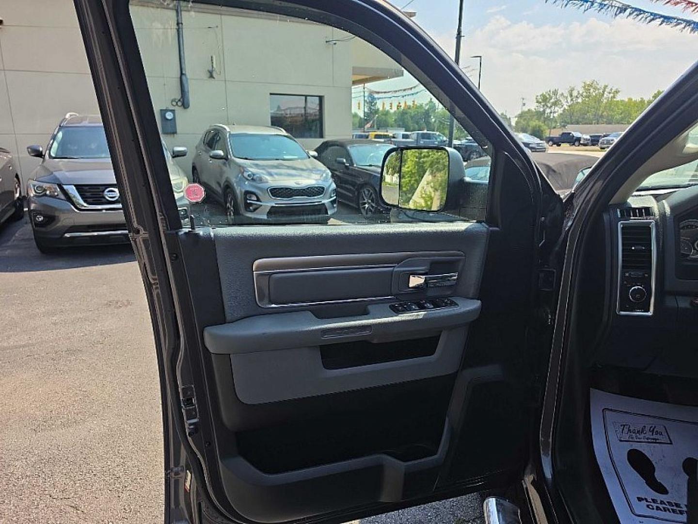 2017 GRAY /GRAY RAM 1500 SLT Quad Cab 4WD (1C6RR7GT7HS) with an 5.7L V8 OHV 16V engine, 8A transmission, located at 3304 Woodville Road, Northwood, OH, 43619, (419) 210-8019, 41.612694, -83.480743- Photo#8