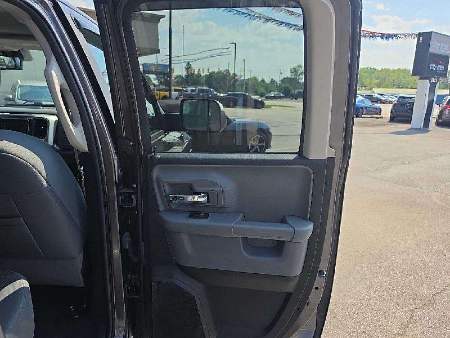 2017 GRAY /GRAY RAM 1500 SLT Quad Cab 4WD (1C6RR7GT7HS) with an 5.7L V8 OHV 16V engine, 8A transmission, located at 3304 Woodville Road, Northwood, OH, 43619, (419) 210-8019, 41.612694, -83.480743- Photo#13