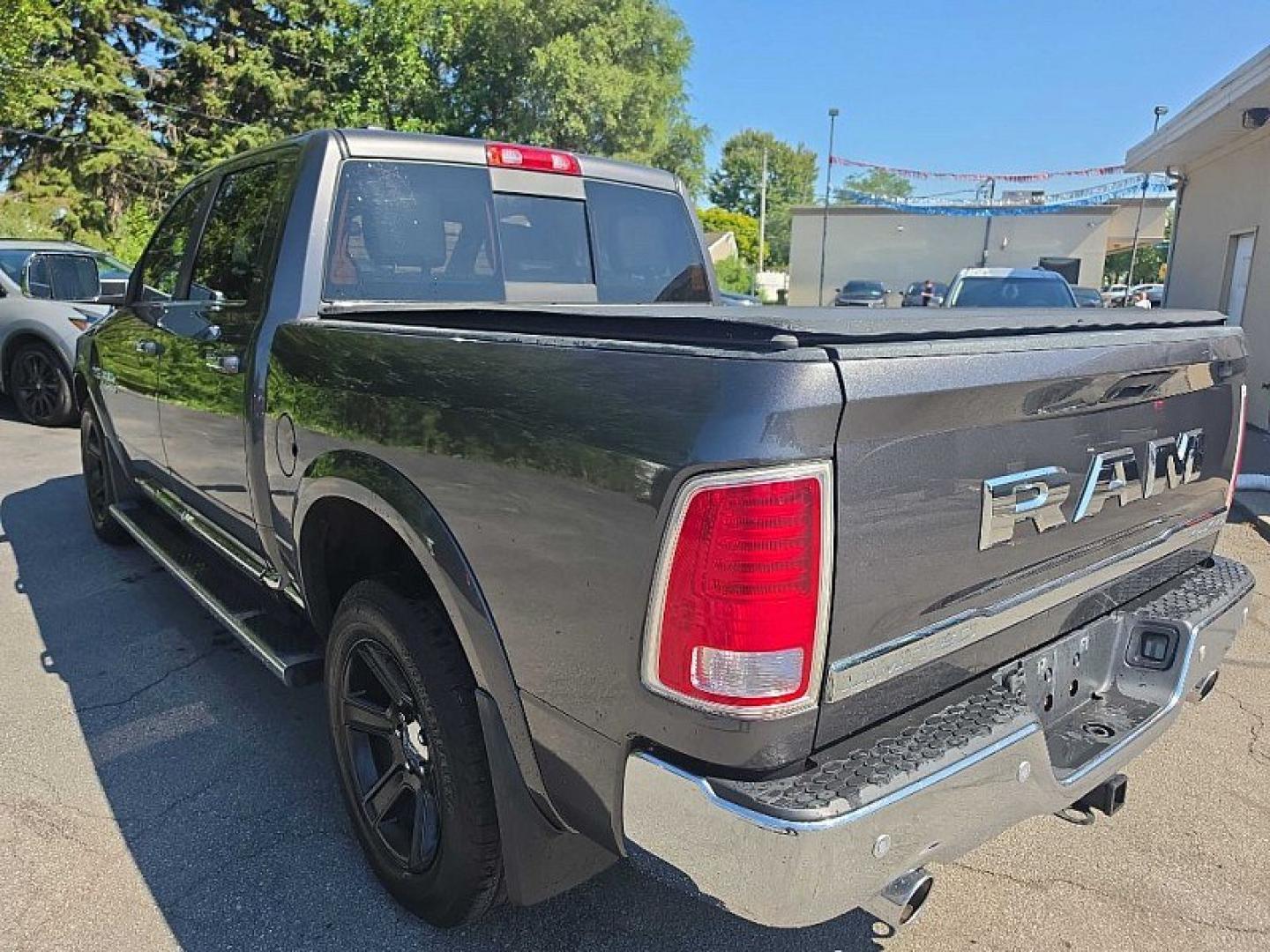 2016 GRAY /BLACK RAM 1500 Longhorn Crew Cab SWB 4WD (1C6RR7PT1GS) with an 5.7L V8 OHV 16V engine, 6A transmission, located at 3304 Woodville Road, Northwood, OH, 43619, (419) 210-8019, 41.612694, -83.480743 - Your #1 Destination for Auto Loans and mdash;No Matter Your Credit!At our dealership, we believe everyone deserves the opportunity to drive their dream car and mdash;whether you have good credit, bad credit, or no credit at all. With a wide selection of hundreds of cars, trucks, and SUVs, you'll fin- Photo#2