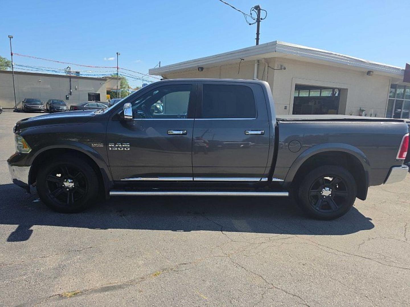 2016 GRAY /BLACK RAM 1500 Longhorn Crew Cab SWB 4WD (1C6RR7PT1GS) with an 5.7L V8 OHV 16V engine, 6A transmission, located at 3304 Woodville Road, Northwood, OH, 43619, (419) 210-8019, 41.612694, -83.480743 - Your #1 Destination for Auto Loans and mdash;No Matter Your Credit!At our dealership, we believe everyone deserves the opportunity to drive their dream car and mdash;whether you have good credit, bad credit, or no credit at all. With a wide selection of hundreds of cars, trucks, and SUVs, you'll fin- Photo#1