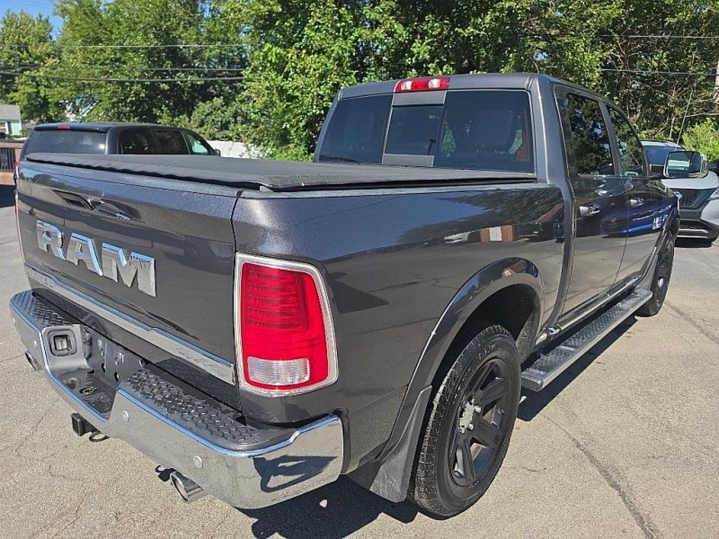 2016 GRAY /BLACK RAM 1500 Longhorn Crew Cab SWB 4WD (1C6RR7PT1GS) with an 5.7L V8 OHV 16V engine, 6A transmission, located at 3304 Woodville Road, Northwood, OH, 43619, (419) 210-8019, 41.612694, -83.480743 - Your #1 Destination for Auto Loans and mdash;No Matter Your Credit!At our dealership, we believe everyone deserves the opportunity to drive their dream car and mdash;whether you have good credit, bad credit, or no credit at all. With a wide selection of hundreds of cars, trucks, and SUVs, you'll fin- Photo#4