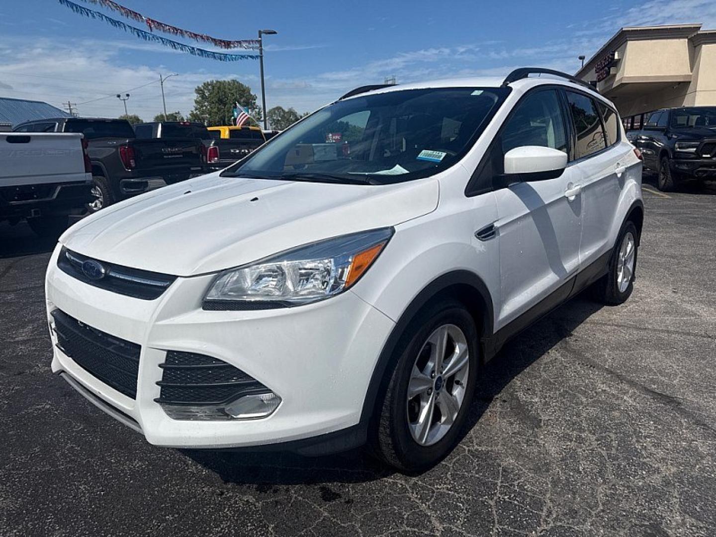 2016 WHITE /TAN Ford Escape SE FWD (1FMCU0GX8GU) with an 1.6L L4 DOHC 16V engine, 6A transmission, located at 3304 Woodville Road, Northwood, OH, 43619, (419) 210-8019, 41.612694, -83.480743 - Your #1 Destination for Auto Loans and mdash;No Matter Your Credit!At our dealership, we believe everyone deserves the opportunity to drive their dream car and mdash;whether you have good credit, bad credit, or no credit at all. With a wide selection of hundreds of cars, trucks, and SUVs, you'll fin- Photo#0