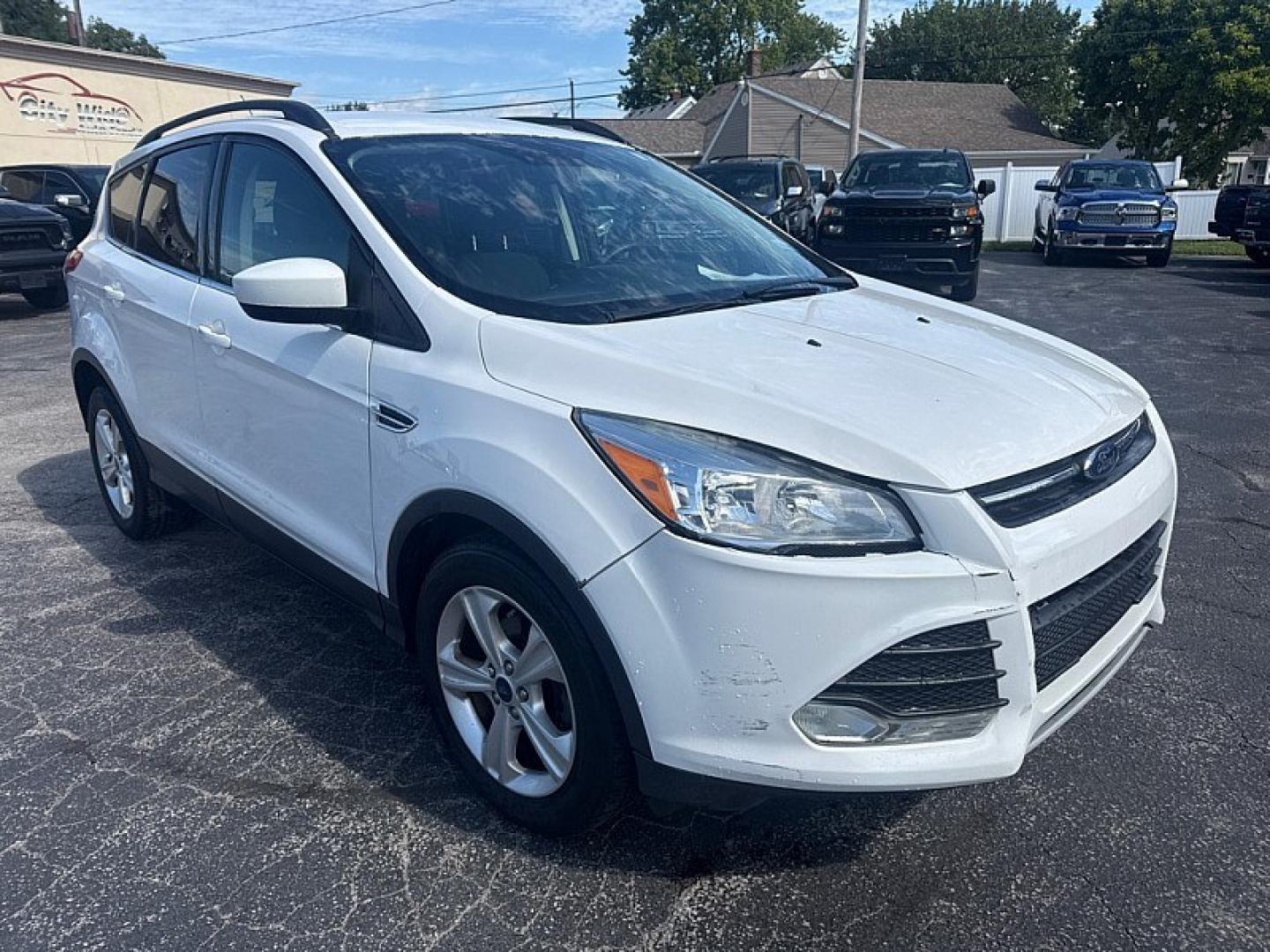 2016 WHITE /TAN Ford Escape SE FWD (1FMCU0GX8GU) with an 1.6L L4 DOHC 16V engine, 6A transmission, located at 3304 Woodville Road, Northwood, OH, 43619, (419) 210-8019, 41.612694, -83.480743 - Your #1 Destination for Auto Loans and mdash;No Matter Your Credit!At our dealership, we believe everyone deserves the opportunity to drive their dream car and mdash;whether you have good credit, bad credit, or no credit at all. With a wide selection of hundreds of cars, trucks, and SUVs, you'll fin- Photo#6