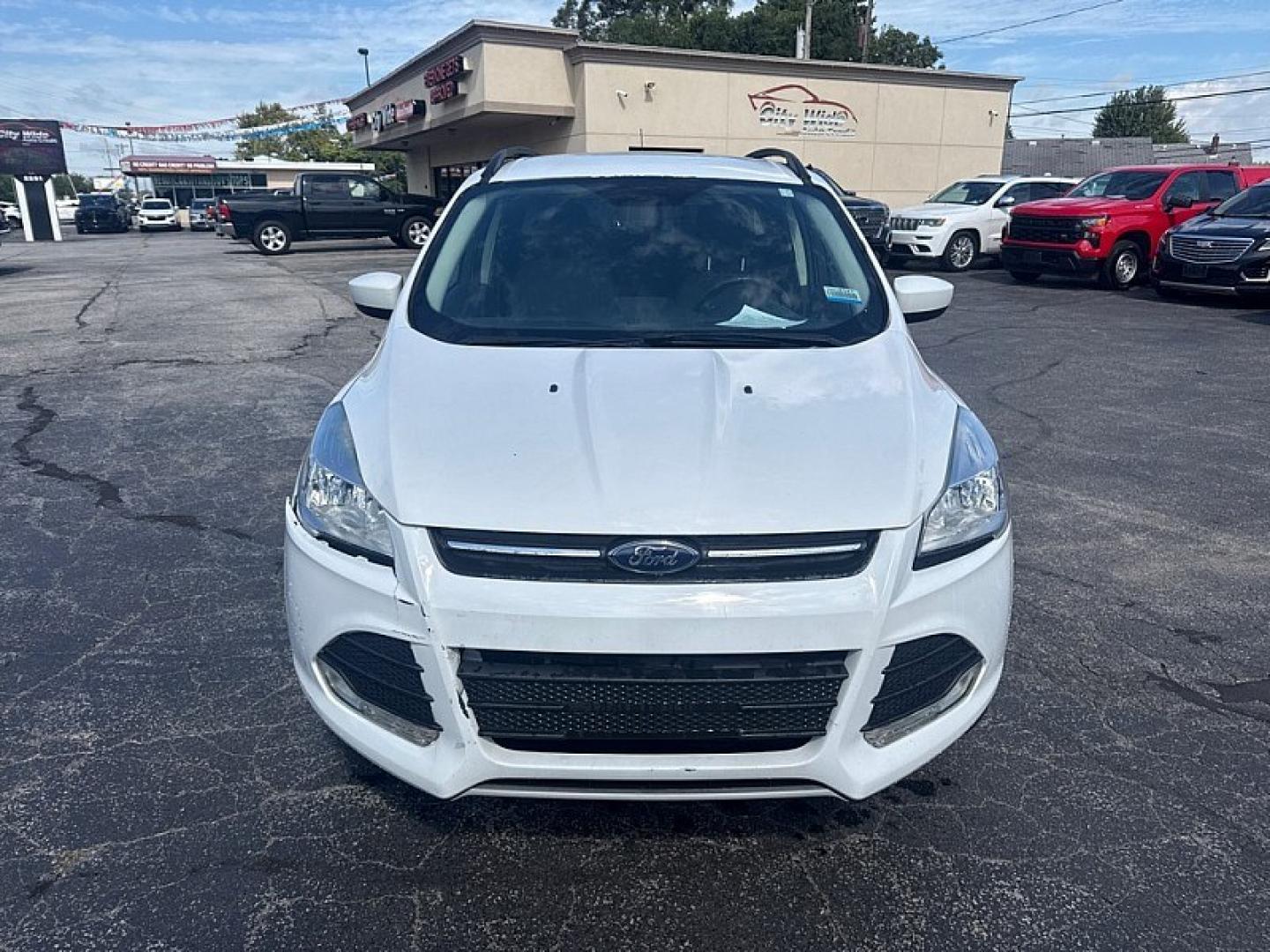 2016 WHITE /TAN Ford Escape SE FWD (1FMCU0GX8GU) with an 1.6L L4 DOHC 16V engine, 6A transmission, located at 3304 Woodville Road, Northwood, OH, 43619, (419) 210-8019, 41.612694, -83.480743 - Your #1 Destination for Auto Loans and mdash;No Matter Your Credit!At our dealership, we believe everyone deserves the opportunity to drive their dream car and mdash;whether you have good credit, bad credit, or no credit at all. With a wide selection of hundreds of cars, trucks, and SUVs, you'll fin- Photo#7