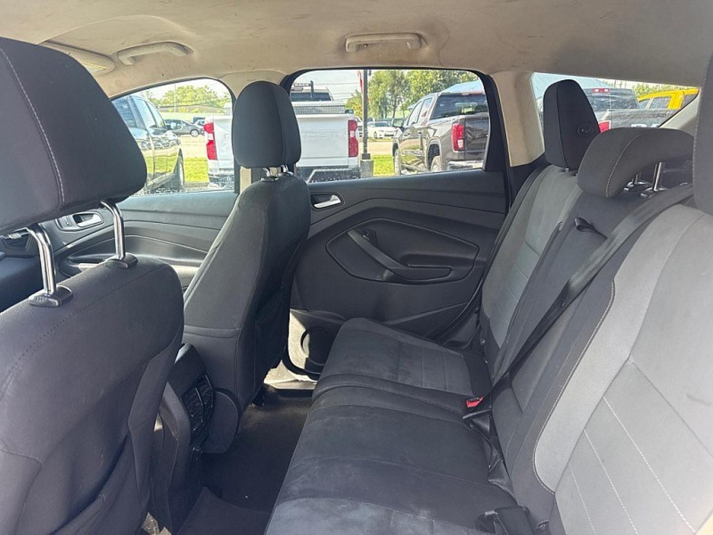 2016 WHITE /TAN Ford Escape SE FWD (1FMCU0GX8GU) with an 1.6L L4 DOHC 16V engine, 6A transmission, located at 3304 Woodville Road, Northwood, OH, 43619, (419) 210-8019, 41.612694, -83.480743 - Your #1 Destination for Auto Loans and mdash;No Matter Your Credit!At our dealership, we believe everyone deserves the opportunity to drive their dream car and mdash;whether you have good credit, bad credit, or no credit at all. With a wide selection of hundreds of cars, trucks, and SUVs, you'll fin- Photo#11