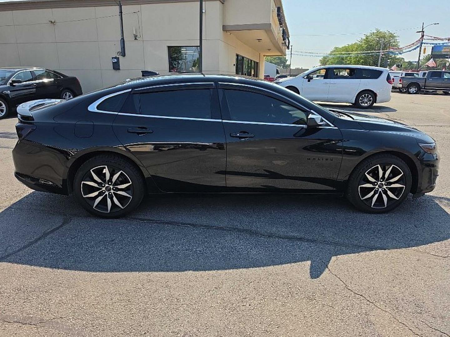 2020 BLACK /BLACK Chevrolet Malibu RS (1G1ZG5ST3LF) with an 1.5L L4 DOHC 16V engine, 6A transmission, located at 3304 Woodville Road, Northwood, OH, 43619, (419) 210-8019, 41.612694, -83.480743 - Your #1 Destination for Auto Loans and mdash;No Matter Your Credit!At our dealership, we believe everyone deserves the opportunity to drive their dream car and mdash;whether you have good credit, bad credit, or no credit at all. With a wide selection of hundreds of cars, trucks, and SUVs, you'll fin- Photo#5