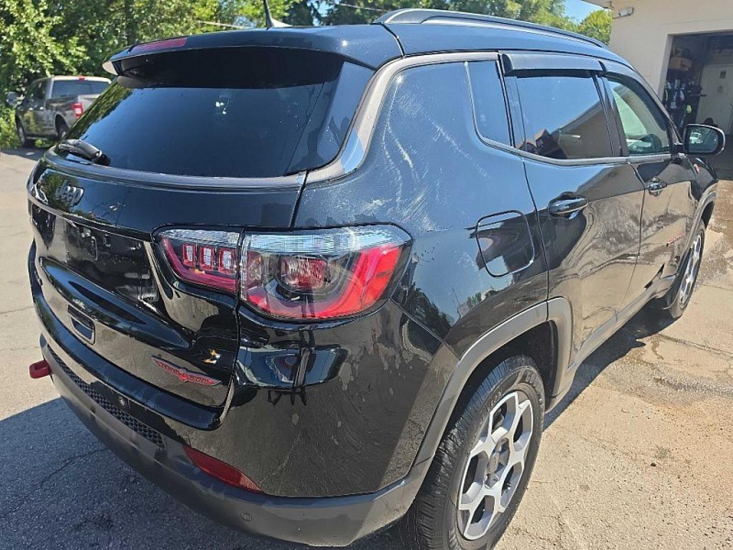 2022 BLACK /BLACK Jeep Compass Trailhawk 4WD (3C4NJDDB0NT) with an 2.4L L4 DOHC 16V engine, 9A transmission, located at 3304 Woodville Road, Northwood, OH, 43619, (419) 210-8019, 41.612694, -83.480743 - Your #1 Destination for Auto Loans and mdash;No Matter Your Credit!At our dealership, we believe everyone deserves the opportunity to drive their dream car and mdash;whether you have good credit, bad credit, or no credit at all. With a wide selection of hundreds of cars, trucks, and SUVs, you'll fin- Photo#4