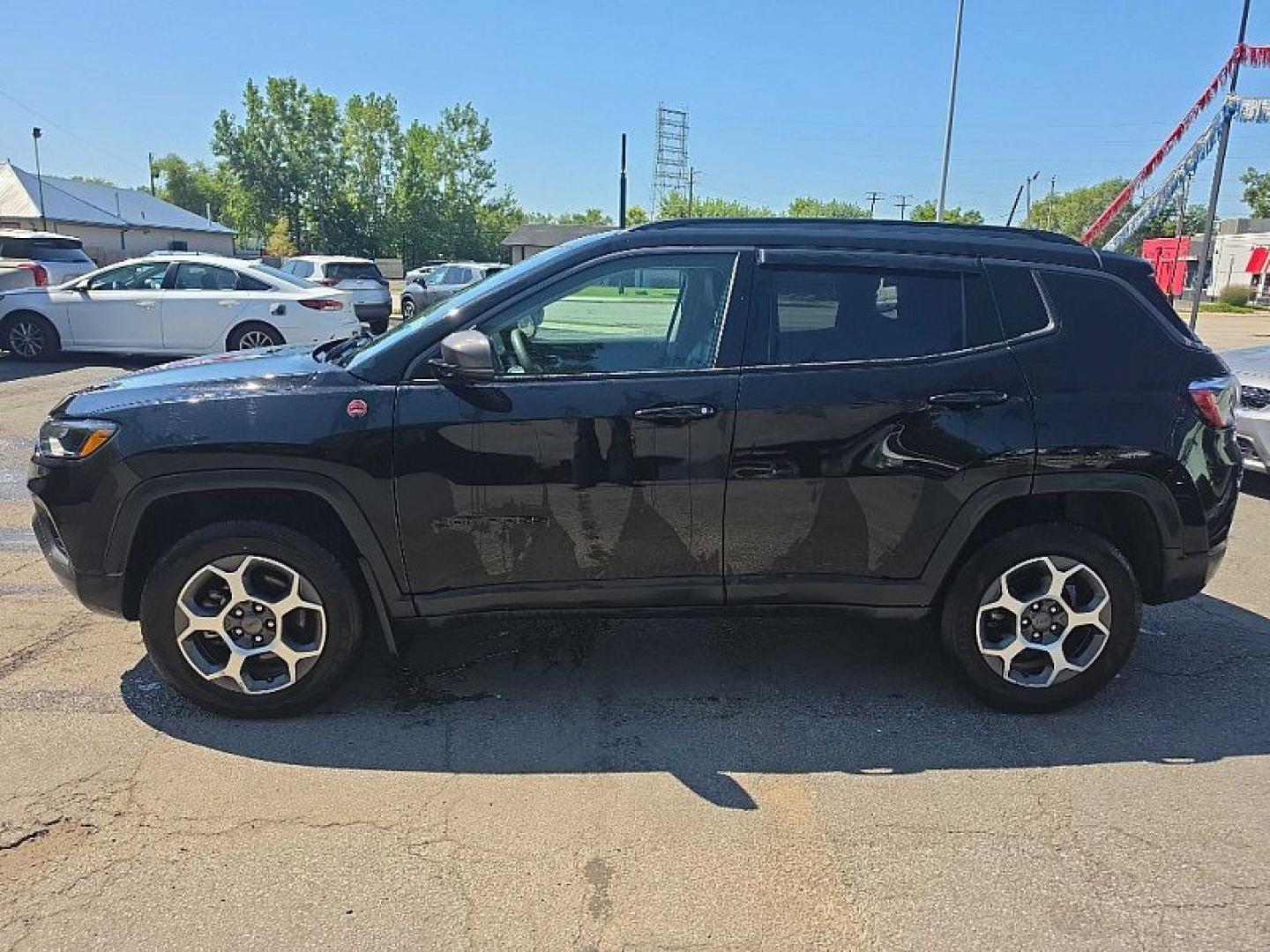 2022 BLACK /BLACK Jeep Compass Trailhawk 4WD (3C4NJDDB0NT) with an 2.4L L4 DOHC 16V engine, 9A transmission, located at 3304 Woodville Road, Northwood, OH, 43619, (419) 210-8019, 41.612694, -83.480743 - Your #1 Destination for Auto Loans and mdash;No Matter Your Credit!At our dealership, we believe everyone deserves the opportunity to drive their dream car and mdash;whether you have good credit, bad credit, or no credit at all. With a wide selection of hundreds of cars, trucks, and SUVs, you'll fin- Photo#1