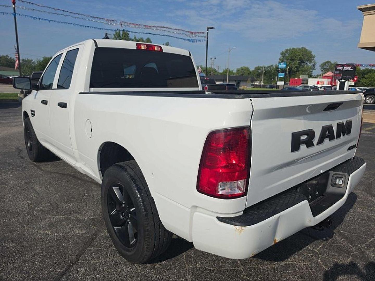 2022 WHITE /BLACK RAM 1500 Classic Tradesman Quad Cab 4WD (1C6RR7FGXNS) with an 3.6L V6 DOHC 24V FFV engine, 8A transmission, located at 3304 Woodville Road, Northwood, OH, 43619, (419) 210-8019, 41.612694, -83.480743 - Your #1 Destination for Auto Loans and mdash;No Matter Your Credit!At our dealership, we believe everyone deserves the opportunity to drive their dream car and mdash;whether you have good credit, bad credit, or no credit at all. With a wide selection of hundreds of cars, trucks, and SUVs, you'll fin- Photo#2