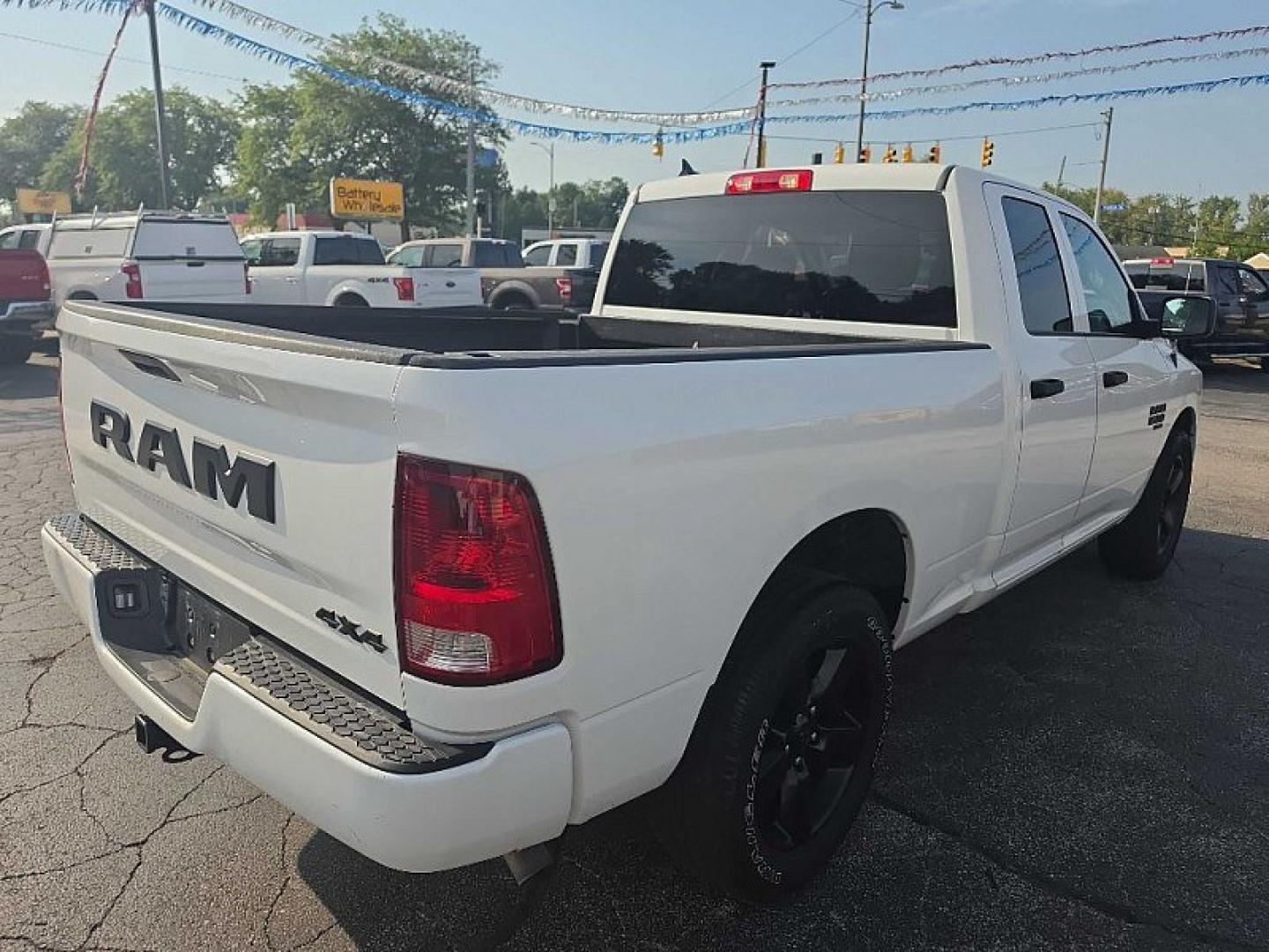 2022 WHITE /BLACK RAM 1500 Classic Tradesman Quad Cab 4WD (1C6RR7FGXNS) with an 3.6L V6 DOHC 24V FFV engine, 8A transmission, located at 3304 Woodville Road, Northwood, OH, 43619, (419) 210-8019, 41.612694, -83.480743 - Your #1 Destination for Auto Loans and mdash;No Matter Your Credit!At our dealership, we believe everyone deserves the opportunity to drive their dream car and mdash;whether you have good credit, bad credit, or no credit at all. With a wide selection of hundreds of cars, trucks, and SUVs, you'll fin- Photo#4