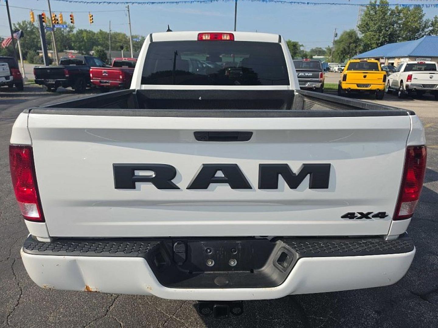2022 WHITE /BLACK RAM 1500 Classic Tradesman Quad Cab 4WD (1C6RR7FGXNS) with an 3.6L V6 DOHC 24V FFV engine, 8A transmission, located at 3304 Woodville Road, Northwood, OH, 43619, (419) 210-8019, 41.612694, -83.480743 - Your #1 Destination for Auto Loans and mdash;No Matter Your Credit!At our dealership, we believe everyone deserves the opportunity to drive their dream car and mdash;whether you have good credit, bad credit, or no credit at all. With a wide selection of hundreds of cars, trucks, and SUVs, you'll fin- Photo#3