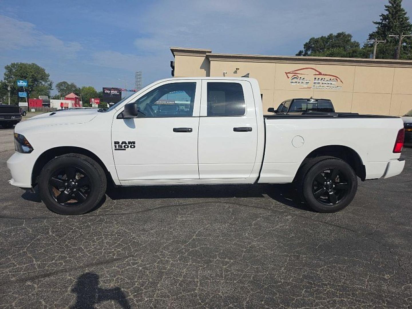 2022 WHITE /BLACK RAM 1500 Classic Tradesman Quad Cab 4WD (1C6RR7FGXNS) with an 3.6L V6 DOHC 24V FFV engine, 8A transmission, located at 3304 Woodville Road, Northwood, OH, 43619, (419) 210-8019, 41.612694, -83.480743 - Your #1 Destination for Auto Loans and mdash;No Matter Your Credit!At our dealership, we believe everyone deserves the opportunity to drive their dream car and mdash;whether you have good credit, bad credit, or no credit at all. With a wide selection of hundreds of cars, trucks, and SUVs, you'll fin- Photo#1
