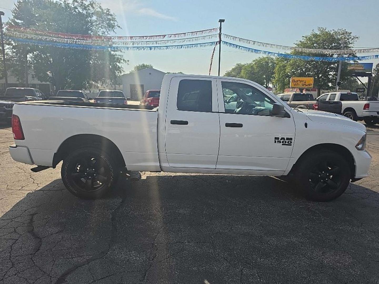 2022 WHITE /BLACK RAM 1500 Classic Tradesman Quad Cab 4WD (1C6RR7FGXNS) with an 3.6L V6 DOHC 24V FFV engine, 8A transmission, located at 3304 Woodville Road, Northwood, OH, 43619, (419) 210-8019, 41.612694, -83.480743 - Your #1 Destination for Auto Loans and mdash;No Matter Your Credit!At our dealership, we believe everyone deserves the opportunity to drive their dream car and mdash;whether you have good credit, bad credit, or no credit at all. With a wide selection of hundreds of cars, trucks, and SUVs, you'll fin- Photo#5