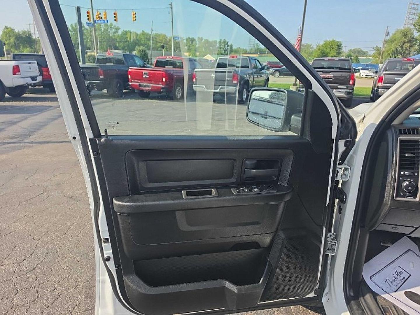 2022 WHITE /BLACK RAM 1500 Classic Tradesman Quad Cab 4WD (1C6RR7FGXNS) with an 3.6L V6 DOHC 24V FFV engine, 8A transmission, located at 3304 Woodville Road, Northwood, OH, 43619, (419) 210-8019, 41.612694, -83.480743 - Your #1 Destination for Auto Loans and mdash;No Matter Your Credit!At our dealership, we believe everyone deserves the opportunity to drive their dream car and mdash;whether you have good credit, bad credit, or no credit at all. With a wide selection of hundreds of cars, trucks, and SUVs, you'll fin- Photo#8