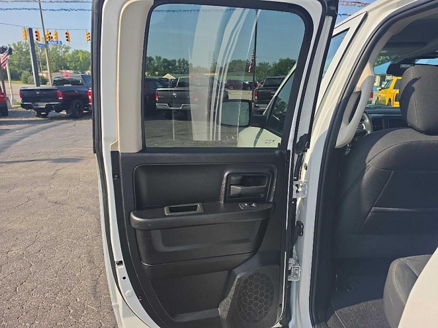 2022 WHITE /BLACK RAM 1500 Classic Tradesman Quad Cab 4WD (1C6RR7FGXNS) with an 3.6L V6 DOHC 24V FFV engine, 8A transmission, located at 3304 Woodville Road, Northwood, OH, 43619, (419) 210-8019, 41.612694, -83.480743 - Your #1 Destination for Auto Loans and mdash;No Matter Your Credit!At our dealership, we believe everyone deserves the opportunity to drive their dream car and mdash;whether you have good credit, bad credit, or no credit at all. With a wide selection of hundreds of cars, trucks, and SUVs, you'll fin- Photo#10