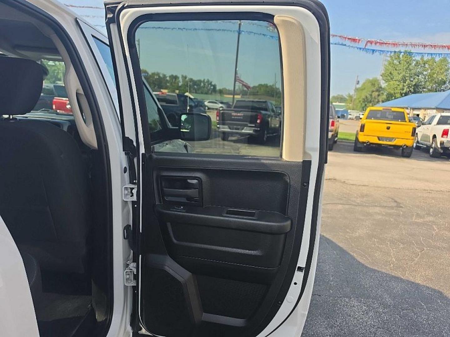 2022 WHITE /BLACK RAM 1500 Classic Tradesman Quad Cab 4WD (1C6RR7FGXNS) with an 3.6L V6 DOHC 24V FFV engine, 8A transmission, located at 3304 Woodville Road, Northwood, OH, 43619, (419) 210-8019, 41.612694, -83.480743 - Your #1 Destination for Auto Loans and mdash;No Matter Your Credit!At our dealership, we believe everyone deserves the opportunity to drive their dream car and mdash;whether you have good credit, bad credit, or no credit at all. With a wide selection of hundreds of cars, trucks, and SUVs, you'll fin- Photo#12