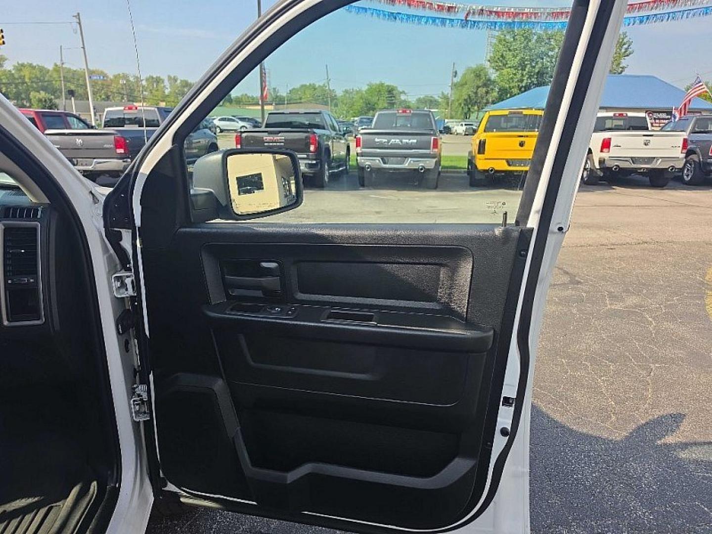 2022 WHITE /BLACK RAM 1500 Classic Tradesman Quad Cab 4WD (1C6RR7FGXNS) with an 3.6L V6 DOHC 24V FFV engine, 8A transmission, located at 3304 Woodville Road, Northwood, OH, 43619, (419) 210-8019, 41.612694, -83.480743 - Your #1 Destination for Auto Loans and mdash;No Matter Your Credit!At our dealership, we believe everyone deserves the opportunity to drive their dream car and mdash;whether you have good credit, bad credit, or no credit at all. With a wide selection of hundreds of cars, trucks, and SUVs, you'll fin- Photo#14