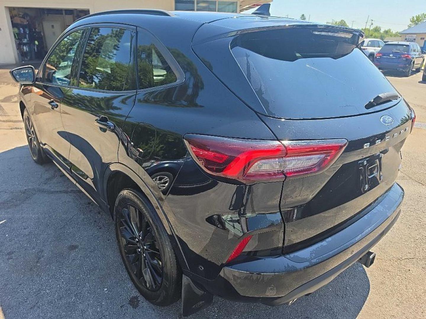 2023 BLACK /BLACK Ford Escape ST-Line Elite Hybrid AWD (1FMCU9PZ1PU) with an 2.5L L4 DOHC 16V HYBRID engine, 8A transmission, located at 3304 Woodville Road, Northwood, OH, 43619, (419) 210-8019, 41.612694, -83.480743 - Your #1 Destination for Auto Loans and mdash;No Matter Your Credit!At our dealership, we believe everyone deserves the opportunity to drive their dream car and mdash;whether you have good credit, bad credit, or no credit at all. With a wide selection of hundreds of cars, trucks, and SUVs, you'll fin- Photo#2