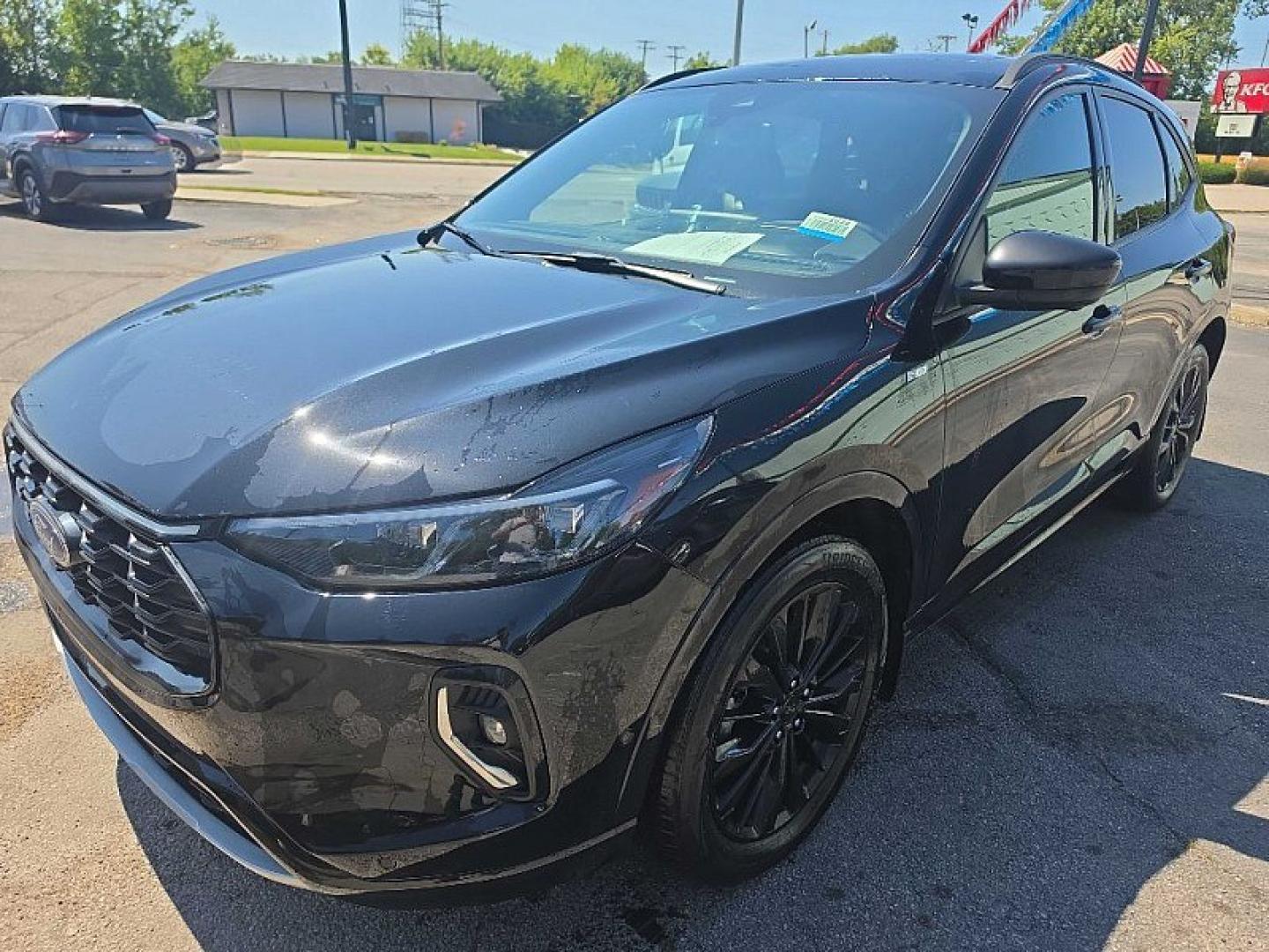 2023 BLACK /BLACK Ford Escape ST-Line Elite Hybrid AWD (1FMCU9PZ1PU) with an 2.5L L4 DOHC 16V HYBRID engine, 8A transmission, located at 3304 Woodville Road, Northwood, OH, 43619, (419) 210-8019, 41.612694, -83.480743 - Your #1 Destination for Auto Loans and mdash;No Matter Your Credit!At our dealership, we believe everyone deserves the opportunity to drive their dream car and mdash;whether you have good credit, bad credit, or no credit at all. With a wide selection of hundreds of cars, trucks, and SUVs, you'll fin- Photo#0