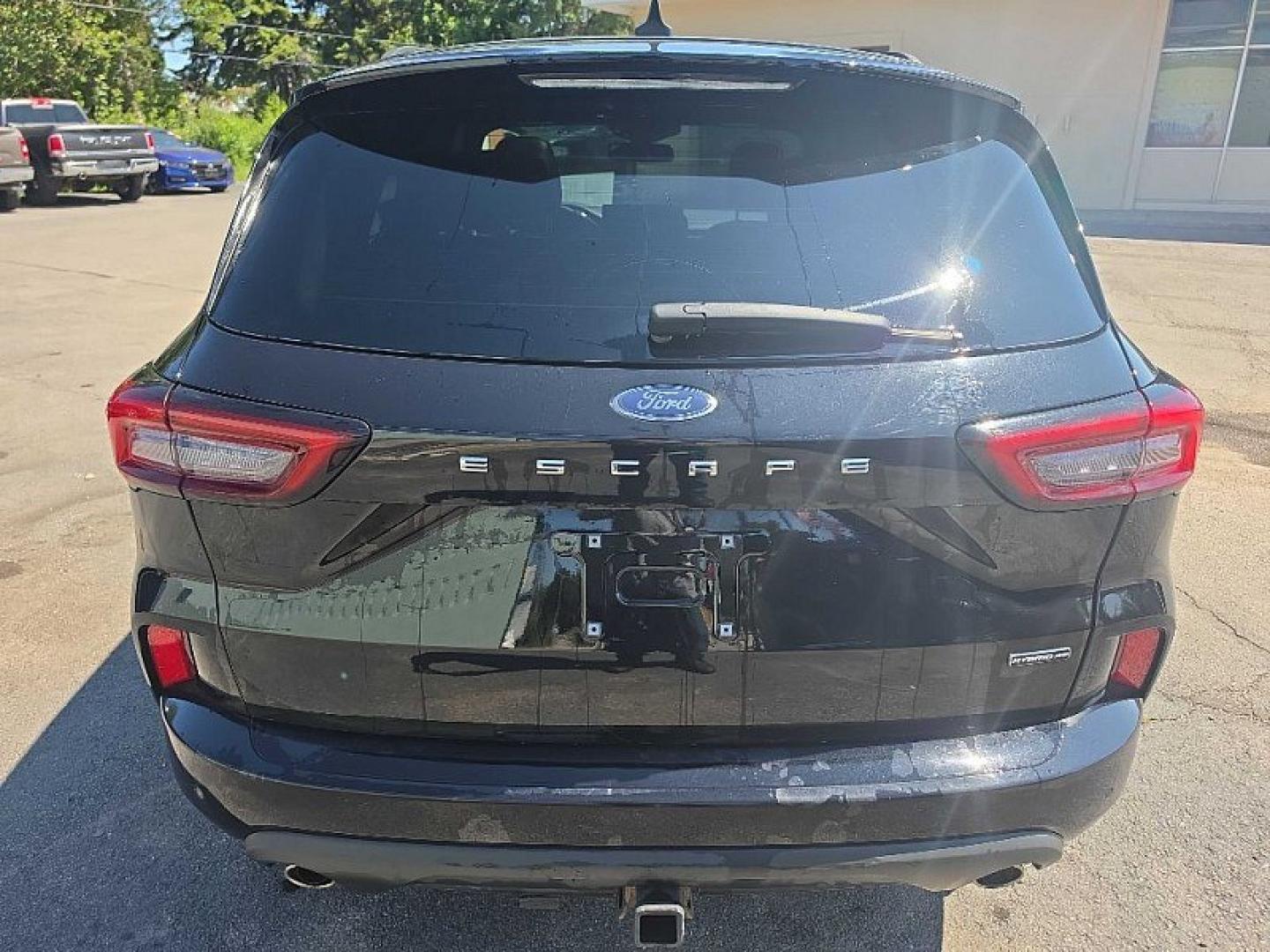 2023 BLACK /BLACK Ford Escape ST-Line Elite Hybrid AWD (1FMCU9PZ1PU) with an 2.5L L4 DOHC 16V HYBRID engine, 8A transmission, located at 3304 Woodville Road, Northwood, OH, 43619, (419) 210-8019, 41.612694, -83.480743 - Your #1 Destination for Auto Loans and mdash;No Matter Your Credit!At our dealership, we believe everyone deserves the opportunity to drive their dream car and mdash;whether you have good credit, bad credit, or no credit at all. With a wide selection of hundreds of cars, trucks, and SUVs, you'll fin- Photo#3