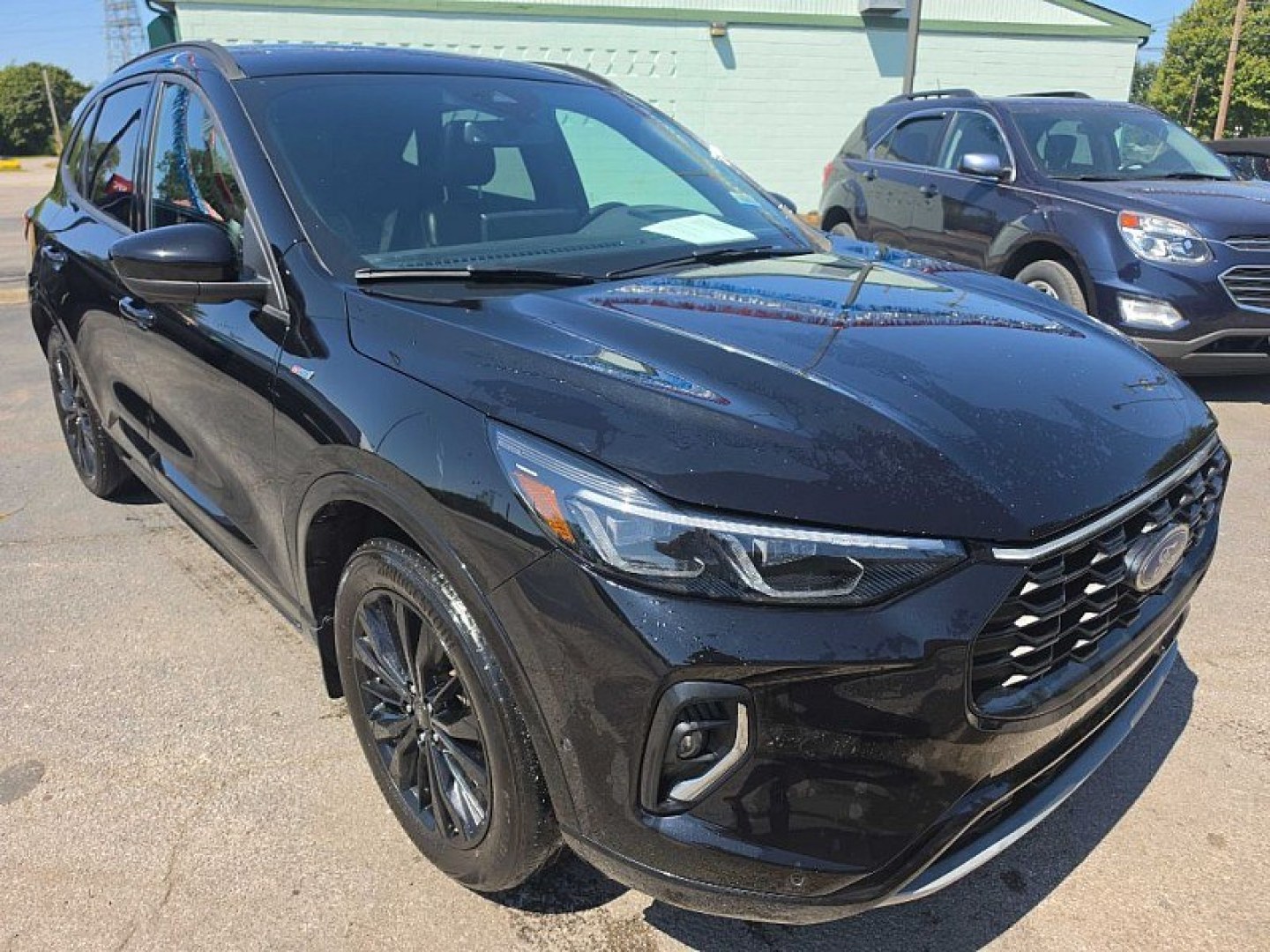 2023 BLACK /BLACK Ford Escape ST-Line Elite Hybrid AWD (1FMCU9PZ1PU) with an 2.5L L4 DOHC 16V HYBRID engine, 8A transmission, located at 3304 Woodville Road, Northwood, OH, 43619, (419) 210-8019, 41.612694, -83.480743 - Your #1 Destination for Auto Loans and mdash;No Matter Your Credit!At our dealership, we believe everyone deserves the opportunity to drive their dream car and mdash;whether you have good credit, bad credit, or no credit at all. With a wide selection of hundreds of cars, trucks, and SUVs, you'll fin- Photo#6