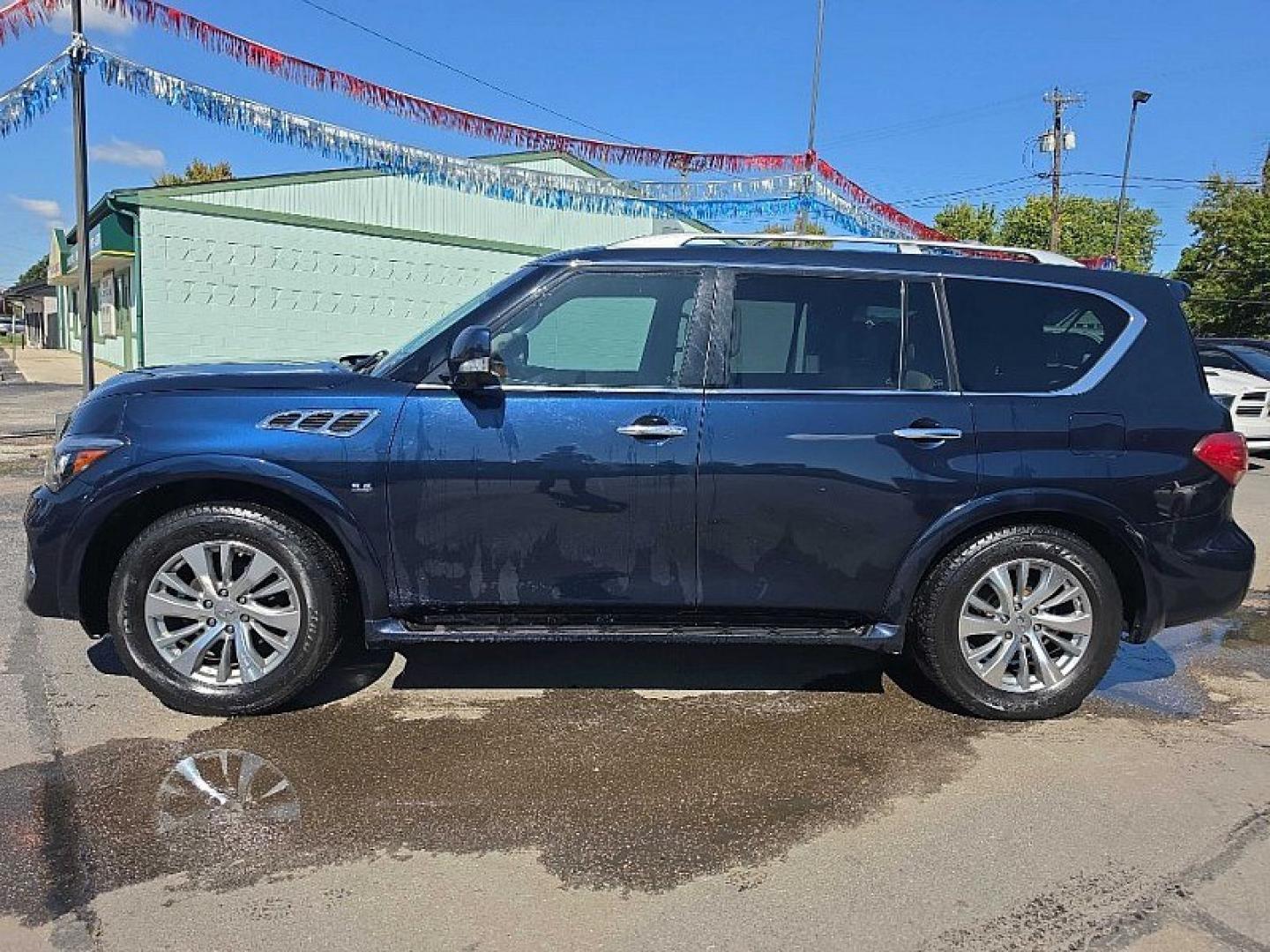2017 BLUE /TAN Infiniti QX80 Limited 4WD (JN8AZ2NC8H9) with an 5.6L V8 DOHC 32V engine, 7A transmission, located at 3304 Woodville Road, Northwood, OH, 43619, (419) 210-8019, 41.612694, -83.480743 - Your #1 Destination for Auto Loans and mdash;No Matter Your Credit!At our dealership, we believe everyone deserves the opportunity to drive their dream car and mdash;whether you have good credit, bad credit, or no credit at all. With a wide selection of hundreds of cars, trucks, and SUVs, you'll fin- Photo#3