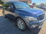 2017 BLUE /TAN Infiniti QX80 Limited 4WD (JN8AZ2NC8H9) with an 5.6L V8 DOHC 32V engine, 7A transmission, located at 3304 Woodville Road, Northwood, OH, 43619, (419) 210-8019, 41.612694, -83.480743 - Your #1 Destination for Auto Loans and mdash;No Matter Your Credit!At our dealership, we believe everyone deserves the opportunity to drive their dream car and mdash;whether you have good credit, bad credit, or no credit at all. With a wide selection of hundreds of cars, trucks, and SUVs, you'll fin- Photo#6