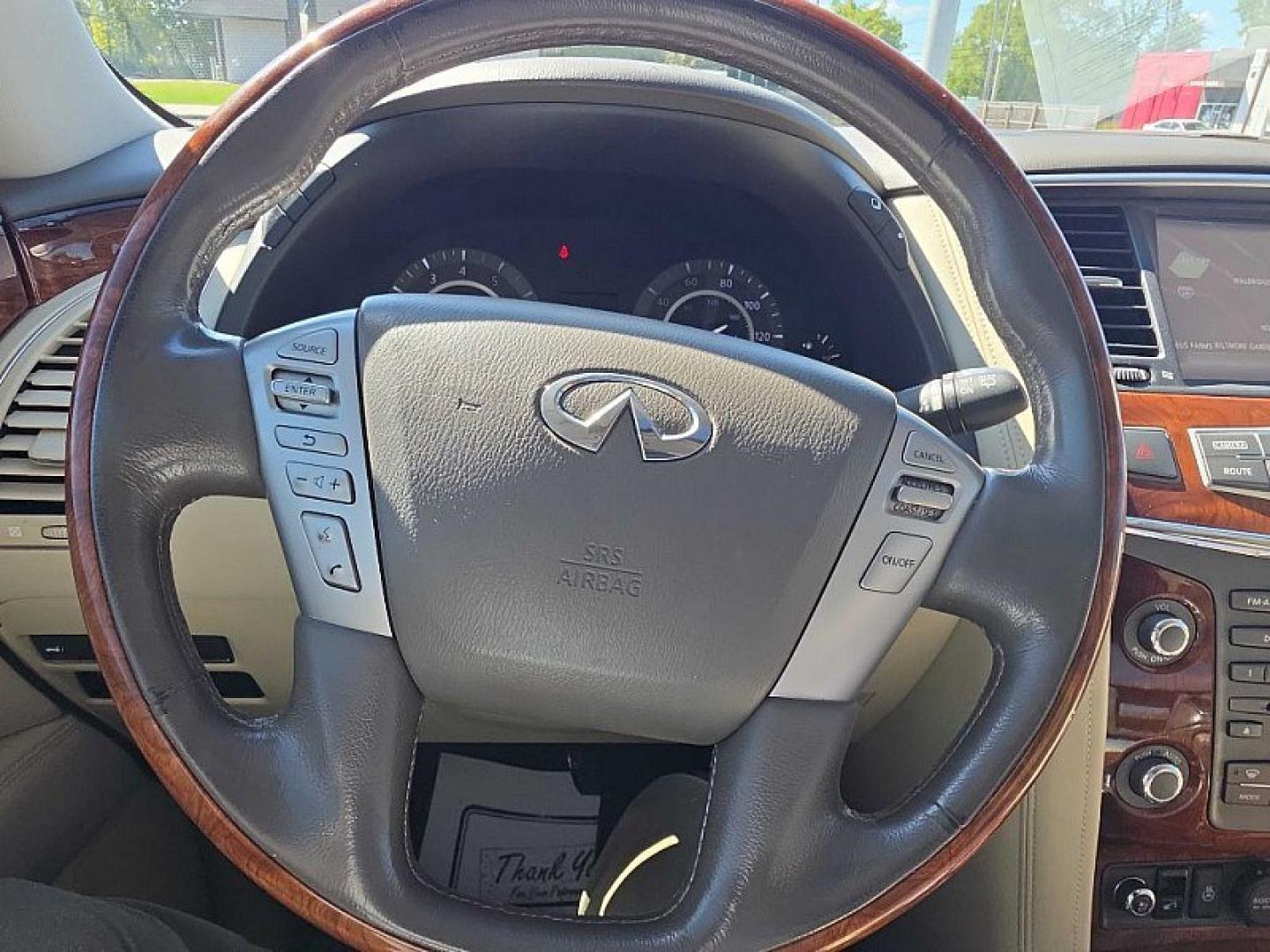 2017 BLUE /TAN Infiniti QX80 Limited 4WD (JN8AZ2NC8H9) with an 5.6L V8 DOHC 32V engine, 7A transmission, located at 3304 Woodville Road, Northwood, OH, 43619, (419) 210-8019, 41.612694, -83.480743 - Your #1 Destination for Auto Loans and mdash;No Matter Your Credit!At our dealership, we believe everyone deserves the opportunity to drive their dream car and mdash;whether you have good credit, bad credit, or no credit at all. With a wide selection of hundreds of cars, trucks, and SUVs, you'll fin- Photo#24