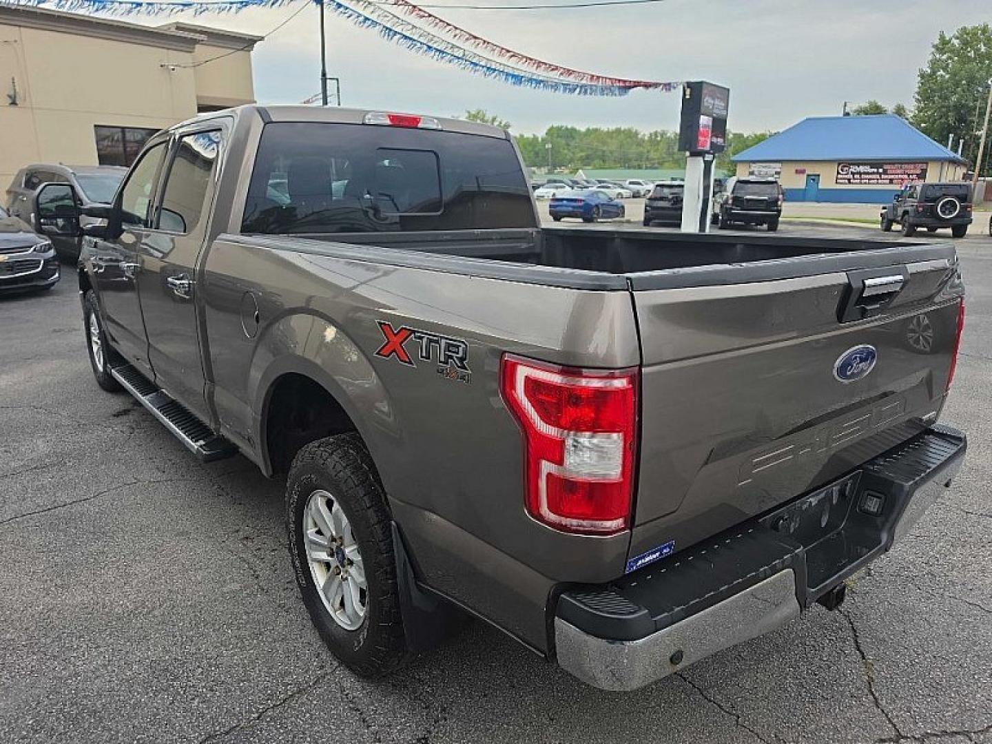 2018 GRAY /GRAY Ford F-150 XLT SuperCrew 5.5-ft. Bed 4WD (1FTFW1EG4JF) with an 3.5 V6 engine, 6A transmission, located at 3304 Woodville Road, Northwood, OH, 43619, (419) 210-8019, 41.612694, -83.480743 - Your #1 Destination for Auto Loans and mdash;No Matter Your Credit!At our dealership, we believe everyone deserves the opportunity to drive their dream car and mdash;whether you have good credit, bad credit, or no credit at all. With a wide selection of hundreds of cars, trucks, and SUVs, you'll fin- Photo#2