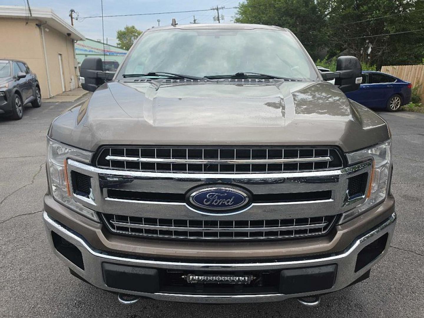 2018 GRAY /GRAY Ford F-150 XLT SuperCrew 5.5-ft. Bed 4WD (1FTFW1EG4JF) with an 3.5 V6 engine, 6A transmission, located at 3304 Woodville Road, Northwood, OH, 43619, (419) 210-8019, 41.612694, -83.480743 - Your #1 Destination for Auto Loans and mdash;No Matter Your Credit!At our dealership, we believe everyone deserves the opportunity to drive their dream car and mdash;whether you have good credit, bad credit, or no credit at all. With a wide selection of hundreds of cars, trucks, and SUVs, you'll fin- Photo#7