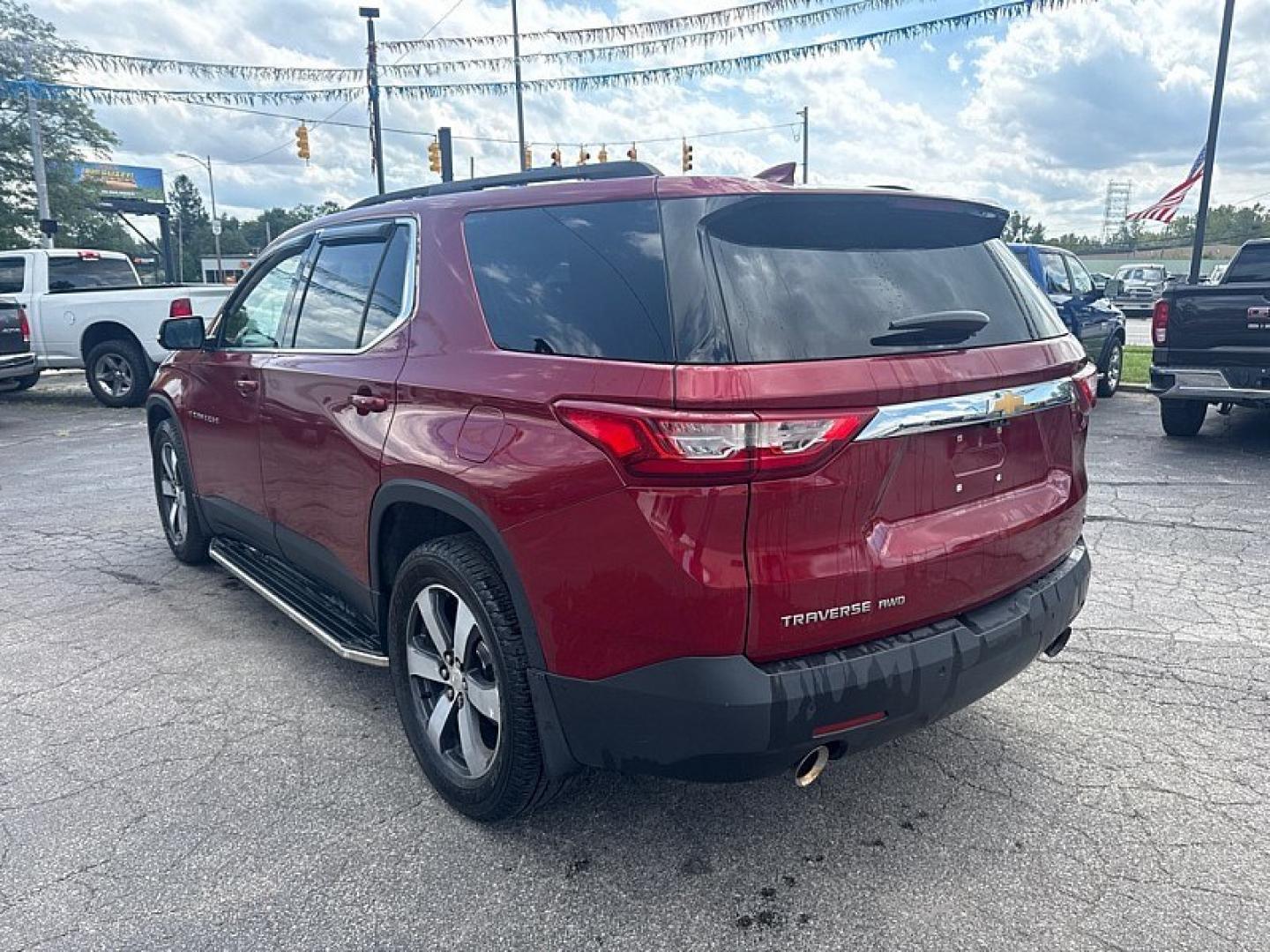 2019 MAROON /BLACK Chevrolet Traverse LT Feather AWD (1GNEVHKW9KJ) with an 3.6L V6 DOHC 24V engine, 9A transmission, located at 3304 Woodville Road, Northwood, OH, 43619, (419) 210-8019, 41.612694, -83.480743 - Your #1 Destination for Auto Loans and mdash;No Matter Your Credit!At our dealership, we believe everyone deserves the opportunity to drive their dream car and mdash;whether you have good credit, bad credit, or no credit at all. With a wide selection of hundreds of cars, trucks, and SUVs, you'll fin- Photo#2