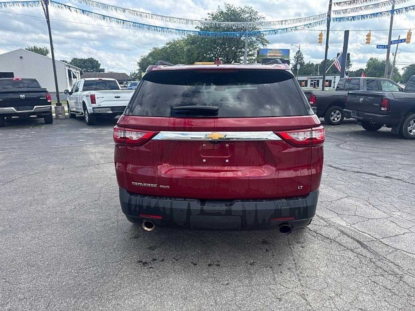 2019 MAROON /BLACK Chevrolet Traverse LT Feather AWD (1GNEVHKW9KJ) with an 3.6L V6 DOHC 24V engine, 9A transmission, located at 3304 Woodville Road, Northwood, OH, 43619, (419) 210-8019, 41.612694, -83.480743 - Your #1 Destination for Auto Loans and mdash;No Matter Your Credit!At our dealership, we believe everyone deserves the opportunity to drive their dream car and mdash;whether you have good credit, bad credit, or no credit at all. With a wide selection of hundreds of cars, trucks, and SUVs, you'll fin- Photo#3