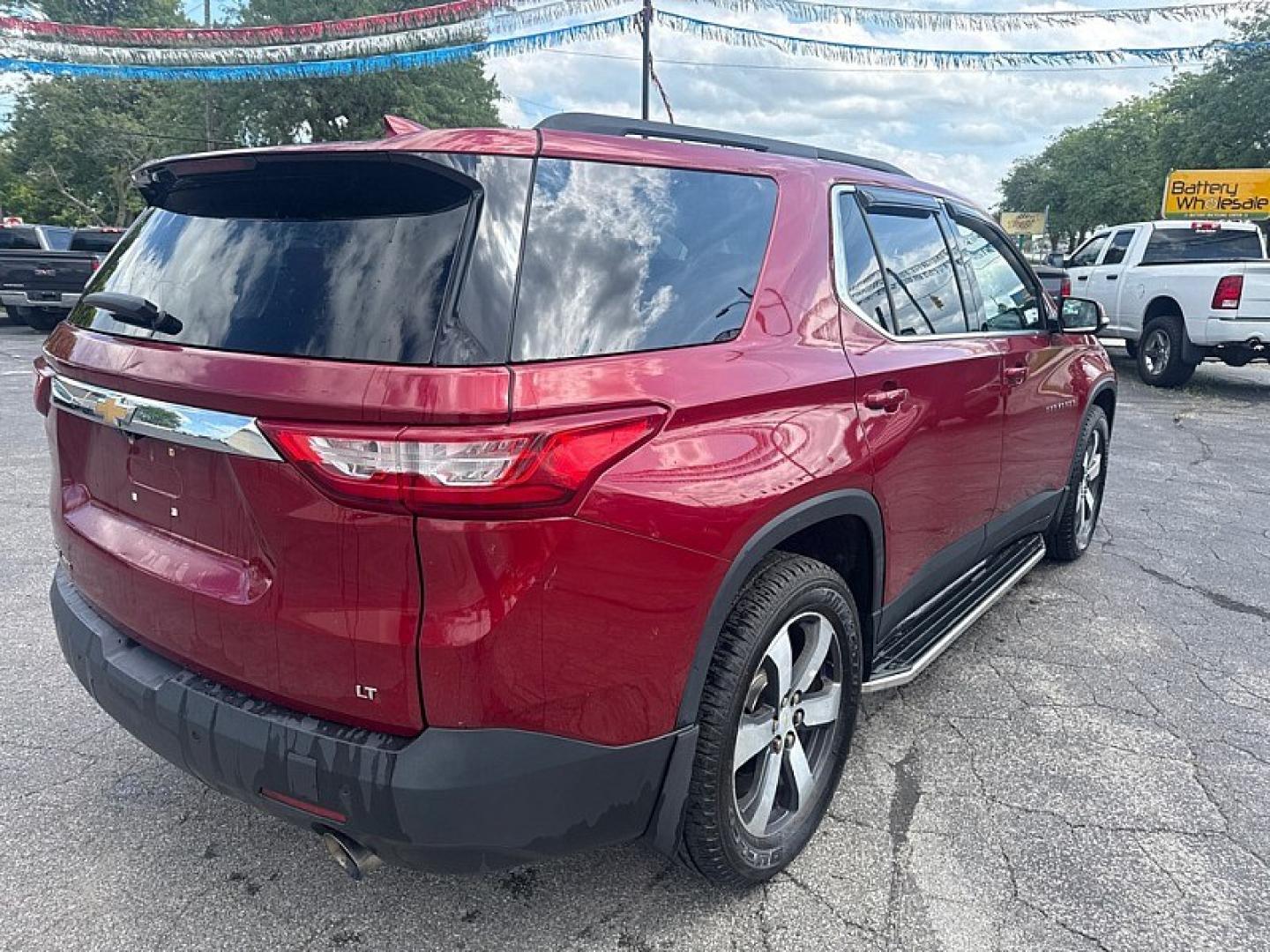 2019 MAROON /BLACK Chevrolet Traverse LT Feather AWD (1GNEVHKW9KJ) with an 3.6L V6 DOHC 24V engine, 9A transmission, located at 3304 Woodville Road, Northwood, OH, 43619, (419) 210-8019, 41.612694, -83.480743 - Your #1 Destination for Auto Loans and mdash;No Matter Your Credit!At our dealership, we believe everyone deserves the opportunity to drive their dream car and mdash;whether you have good credit, bad credit, or no credit at all. With a wide selection of hundreds of cars, trucks, and SUVs, you'll fin- Photo#4