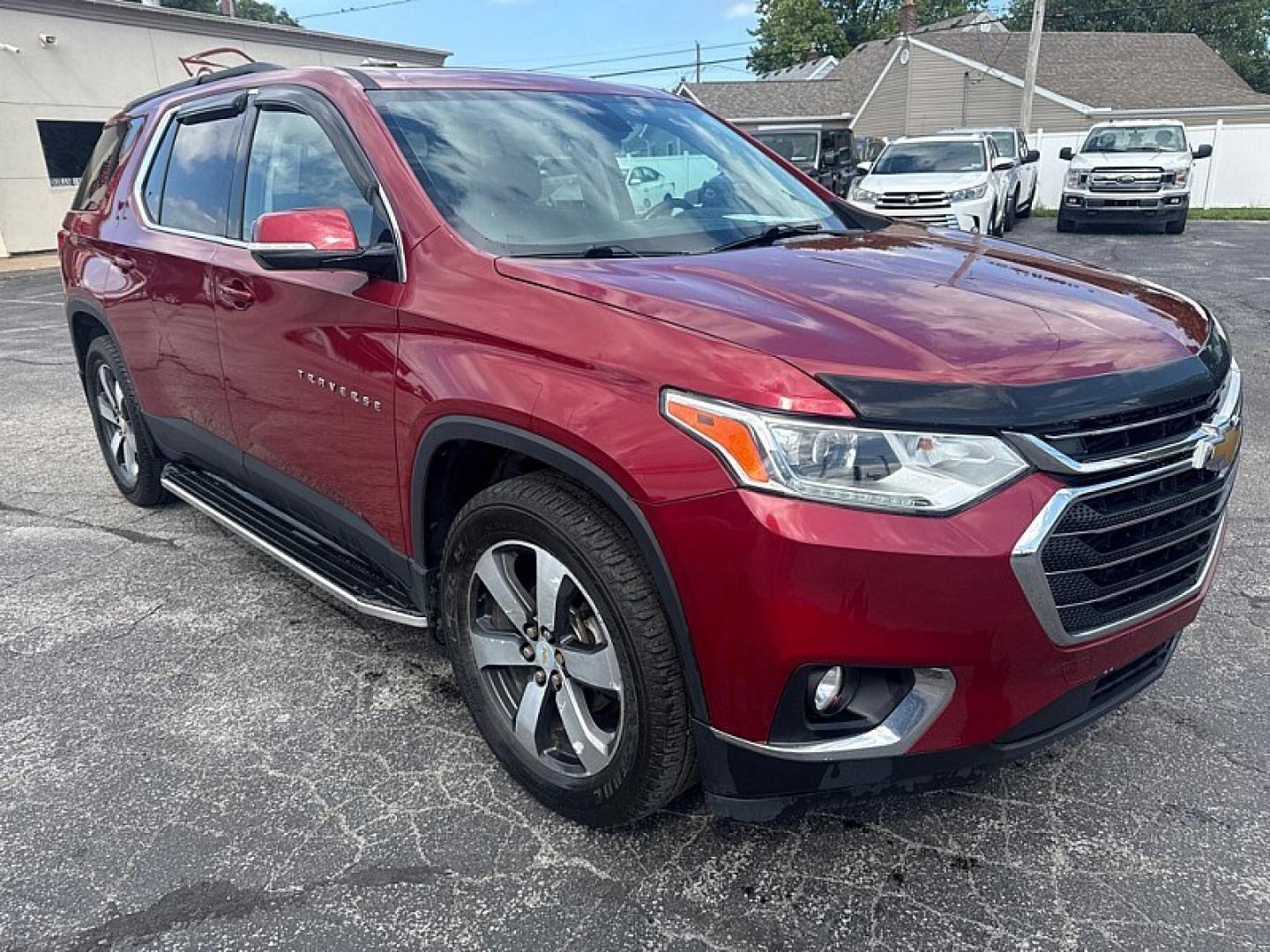 2019 MAROON /BLACK Chevrolet Traverse LT Feather AWD (1GNEVHKW9KJ) with an 3.6L V6 DOHC 24V engine, 9A transmission, located at 3304 Woodville Road, Northwood, OH, 43619, (419) 210-8019, 41.612694, -83.480743 - Your #1 Destination for Auto Loans and mdash;No Matter Your Credit!At our dealership, we believe everyone deserves the opportunity to drive their dream car and mdash;whether you have good credit, bad credit, or no credit at all. With a wide selection of hundreds of cars, trucks, and SUVs, you'll fin- Photo#6