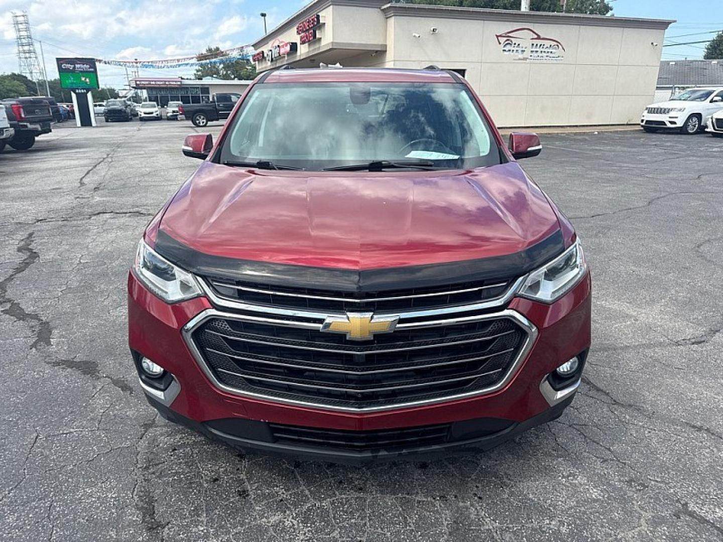 2019 MAROON /BLACK Chevrolet Traverse LT Feather AWD (1GNEVHKW9KJ) with an 3.6L V6 DOHC 24V engine, 9A transmission, located at 3304 Woodville Road, Northwood, OH, 43619, (419) 210-8019, 41.612694, -83.480743 - Your #1 Destination for Auto Loans and mdash;No Matter Your Credit!At our dealership, we believe everyone deserves the opportunity to drive their dream car and mdash;whether you have good credit, bad credit, or no credit at all. With a wide selection of hundreds of cars, trucks, and SUVs, you'll fin- Photo#7