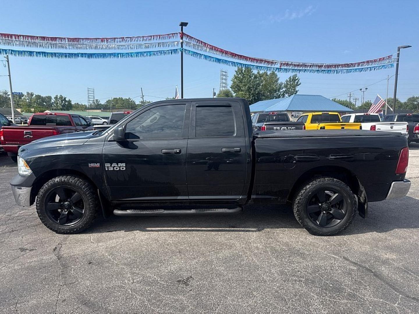 2017 BLACK /BLACK RAM 1500 Tradesman Quad Cab 4WD (1C6RR7FTXHS) with an 5.7L V8 OHV 16V engine, 8A transmission, located at 3304 Woodville Road, Northwood, OH, 43619, (419) 210-8019, 41.612694, -83.480743 - Your #1 Destination for Auto Loans and mdash;No Matter Your Credit!At our dealership, we believe everyone deserves the opportunity to drive their dream car and mdash;whether you have good credit, bad credit, or no credit at all. With a wide selection of hundreds of cars, trucks, and SUVs, you'll fin- Photo#1