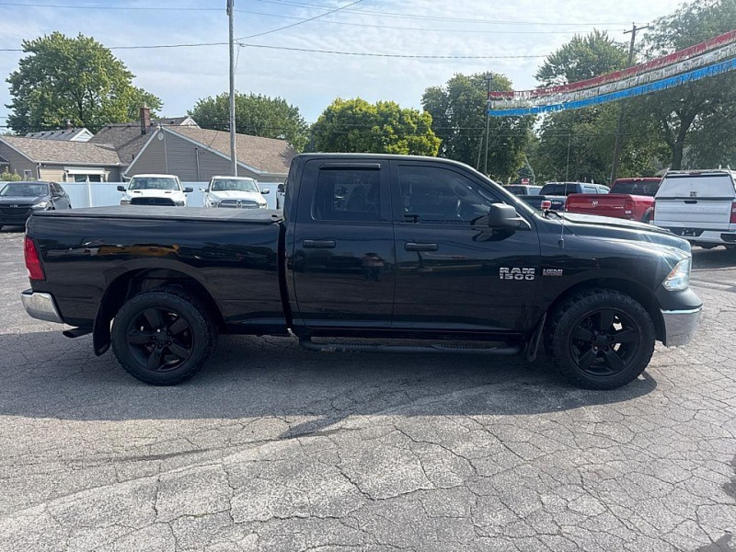2017 BLACK /BLACK RAM 1500 Tradesman Quad Cab 4WD (1C6RR7FTXHS) with an 5.7L V8 OHV 16V engine, 8A transmission, located at 3304 Woodville Road, Northwood, OH, 43619, (419) 210-8019, 41.612694, -83.480743 - Your #1 Destination for Auto Loans and mdash;No Matter Your Credit!At our dealership, we believe everyone deserves the opportunity to drive their dream car and mdash;whether you have good credit, bad credit, or no credit at all. With a wide selection of hundreds of cars, trucks, and SUVs, you'll fin- Photo#5