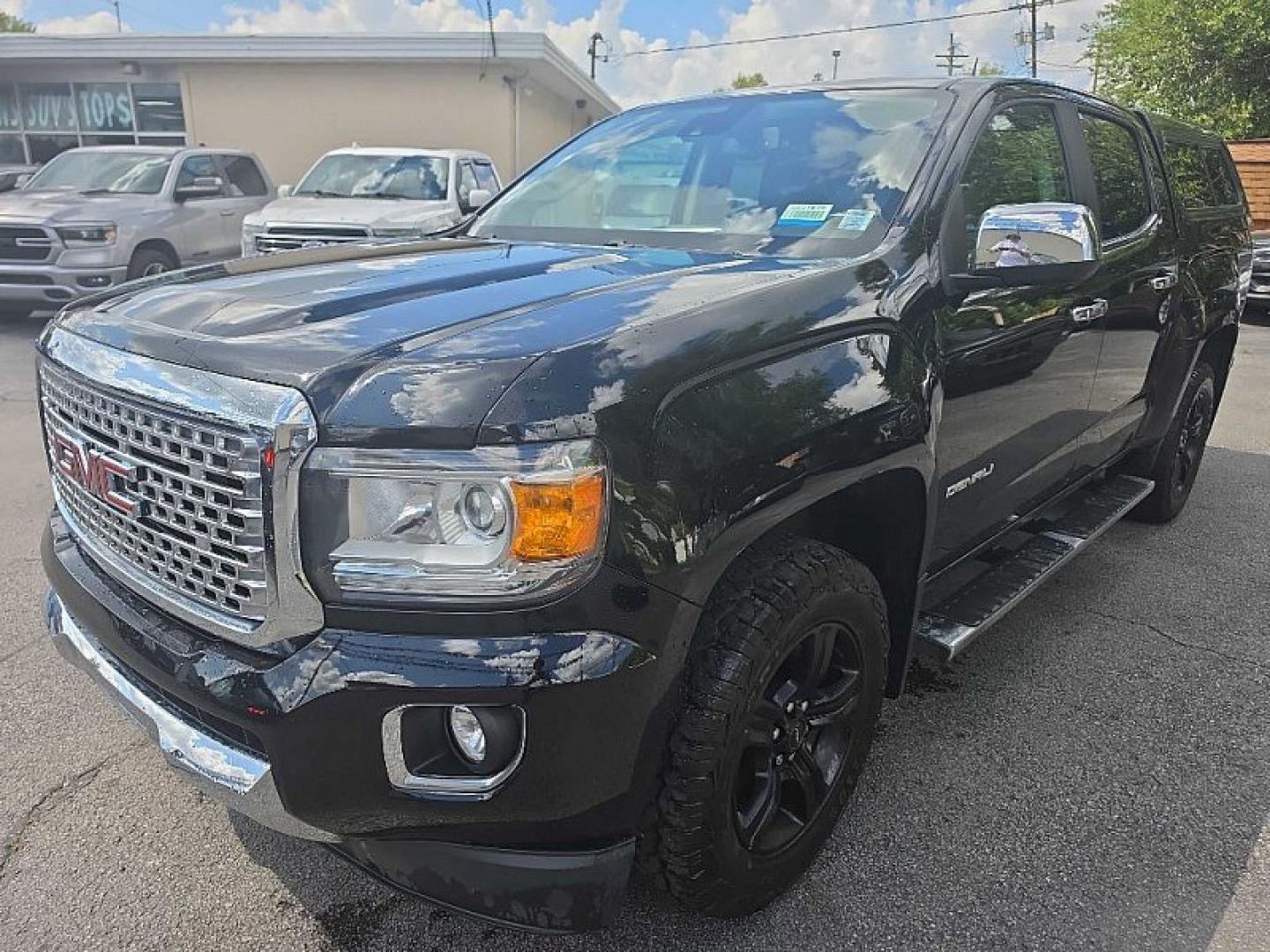 2018 BLACK /BLACK GMC Canyon Denali Crew Cab 4WD Long Box (1GTG6EEN7J1) with an 3.6L V6 DOHC 24V engine, 6A transmission, located at 3304 Woodville Road, Northwood, OH, 43619, (419) 210-8019, 41.612694, -83.480743 - Your #1 Destination for Auto Loans and mdash;No Matter Your Credit!At our dealership, we believe everyone deserves the opportunity to drive their dream car and mdash;whether you have good credit, bad credit, or no credit at all. With a wide selection of hundreds of cars, trucks, and SUVs, you'll fin- Photo#0