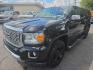 2018 BLACK /BLACK GMC Canyon Denali Crew Cab 4WD Long Box (1GTG6EEN7J1) with an 3.6L V6 DOHC 24V engine, 6A transmission, located at 3304 Woodville Road, Northwood, OH, 43619, (419) 210-8019, 41.612694, -83.480743 - Your #1 Destination for Auto Loans and mdash;No Matter Your Credit!At our dealership, we believe everyone deserves the opportunity to drive their dream car and mdash;whether you have good credit, bad credit, or no credit at all. With a wide selection of hundreds of cars, trucks, and SUVs, you'll fin- Photo#0
