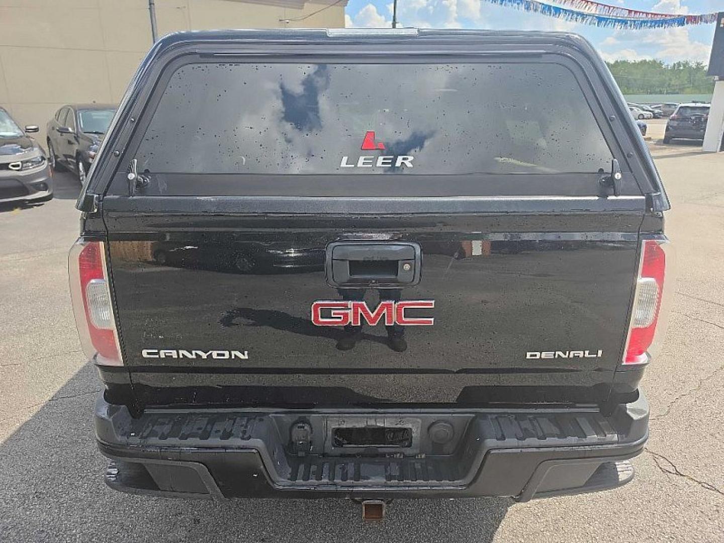 2018 BLACK /BLACK GMC Canyon Denali Crew Cab 4WD Long Box (1GTG6EEN7J1) with an 3.6L V6 DOHC 24V engine, 6A transmission, located at 3304 Woodville Road, Northwood, OH, 43619, (419) 210-8019, 41.612694, -83.480743 - Your #1 Destination for Auto Loans and mdash;No Matter Your Credit!At our dealership, we believe everyone deserves the opportunity to drive their dream car and mdash;whether you have good credit, bad credit, or no credit at all. With a wide selection of hundreds of cars, trucks, and SUVs, you'll fin- Photo#3