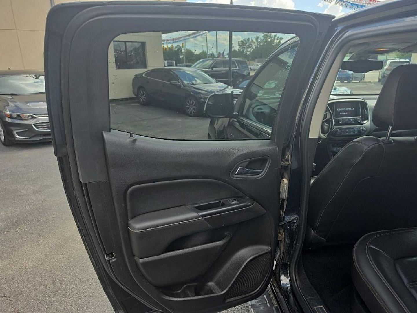2018 BLACK /BLACK GMC Canyon Denali Crew Cab 4WD Long Box (1GTG6EEN7J1) with an 3.6L V6 DOHC 24V engine, 6A transmission, located at 3304 Woodville Road, Northwood, OH, 43619, (419) 210-8019, 41.612694, -83.480743 - Your #1 Destination for Auto Loans and mdash;No Matter Your Credit!At our dealership, we believe everyone deserves the opportunity to drive their dream car and mdash;whether you have good credit, bad credit, or no credit at all. With a wide selection of hundreds of cars, trucks, and SUVs, you'll fin- Photo#12