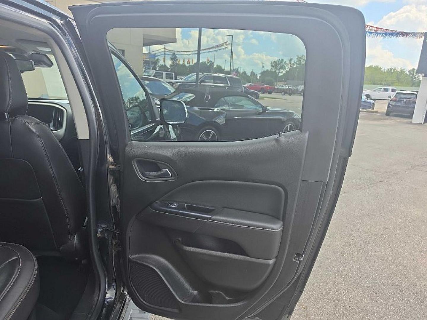 2018 BLACK /BLACK GMC Canyon Denali Crew Cab 4WD Long Box (1GTG6EEN7J1) with an 3.6L V6 DOHC 24V engine, 6A transmission, located at 3304 Woodville Road, Northwood, OH, 43619, (419) 210-8019, 41.612694, -83.480743 - Your #1 Destination for Auto Loans and mdash;No Matter Your Credit!At our dealership, we believe everyone deserves the opportunity to drive their dream car and mdash;whether you have good credit, bad credit, or no credit at all. With a wide selection of hundreds of cars, trucks, and SUVs, you'll fin- Photo#14