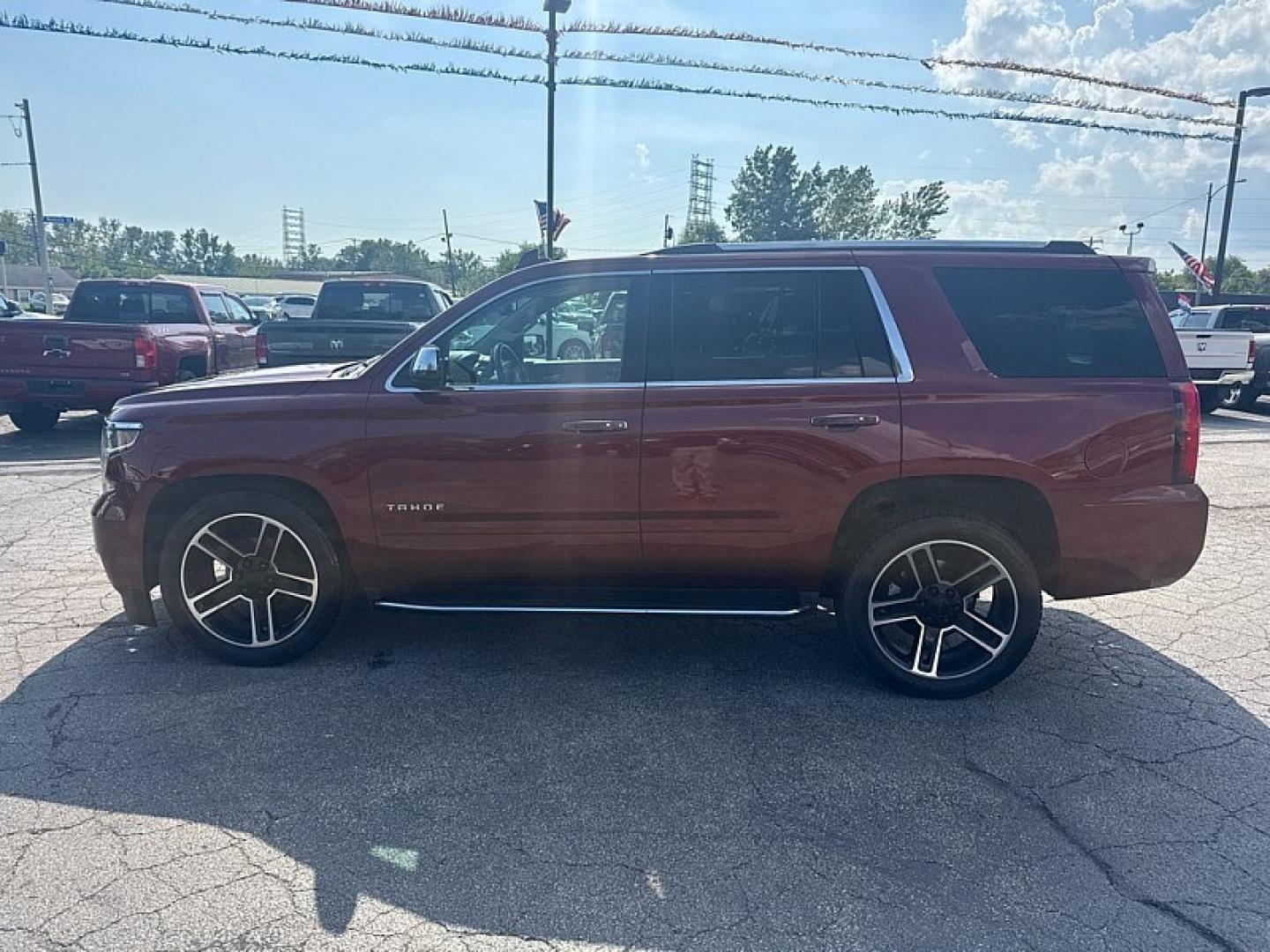 2020 RED /BEIGE Chevrolet Tahoe Premier 4WD (1GNSKCKC6LR) with an 5.3L V8 OHV 16V engine, 6A transmission, located at 3304 Woodville Road, Northwood, OH, 43619, (419) 210-8019, 41.612694, -83.480743 - Your #1 Destination for Auto Loans and mdash;No Matter Your Credit!At our dealership, we believe everyone deserves the opportunity to drive their dream car and mdash;whether you have good credit, bad credit, or no credit at all. With a wide selection of hundreds of cars, trucks, and SUVs, you'll fin- Photo#1